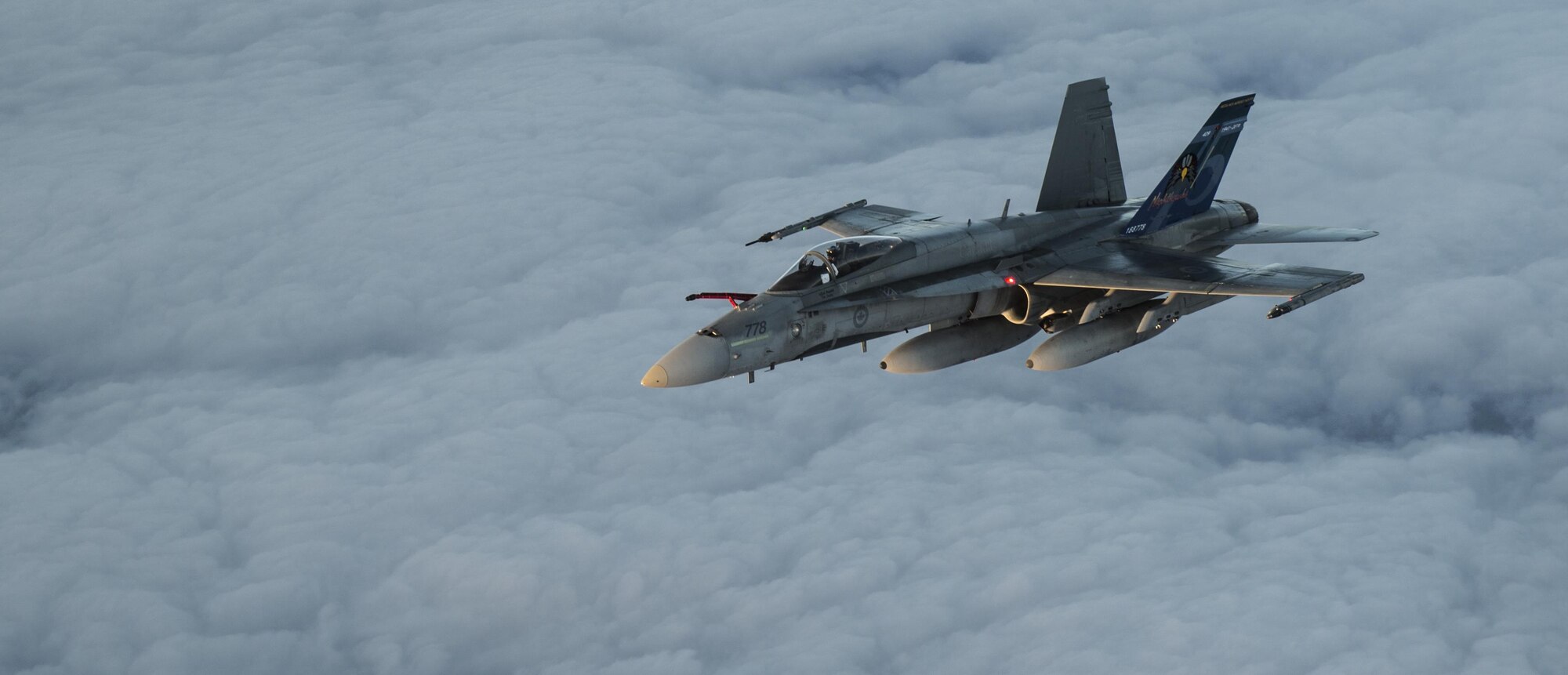 A U.S. Air Force KC-135 Stratotanker flown by the 912th Air Refueling Squadron from March Air Force Base, Calif., provides refueling capabilities to Royal Canadian Air Force CF-18s while both units participate in the Vigilant Shield 2017 Field Training Exercise Oct. 20, 2016, in the high arctic. This exercise provides crucial training opportunities for numerous military personnel with a variety of aircraft and assets from Canada and the United States to improve interoperability and to demonstrate North American Aerospace Defense Command’s ability to defend North America.(U.S. Air Force Photo by Tech. Sgt. Gregory Brook)