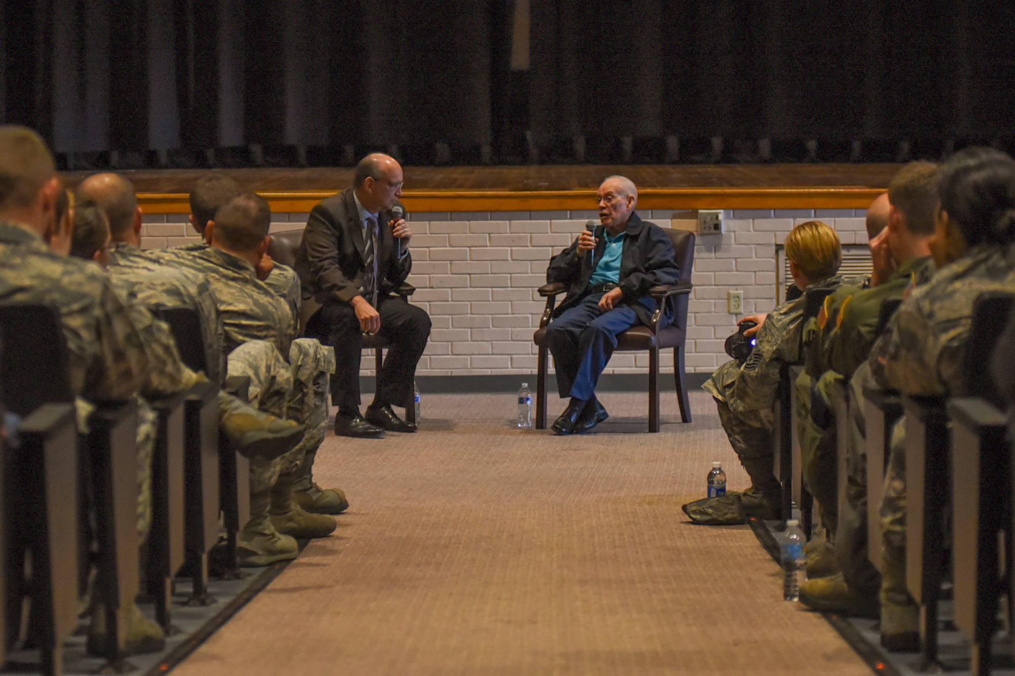 Eddie Graham, right, retired Army sergeant, speaks to Airmen at McConnell Air Force Base, Kan., Oct. 20, 2016. Graham gave a speech about how his experiences during World War II and surviving the Bataan Death March. (U.S. Air Force photo/Senior Airman Christopher Thornbury)