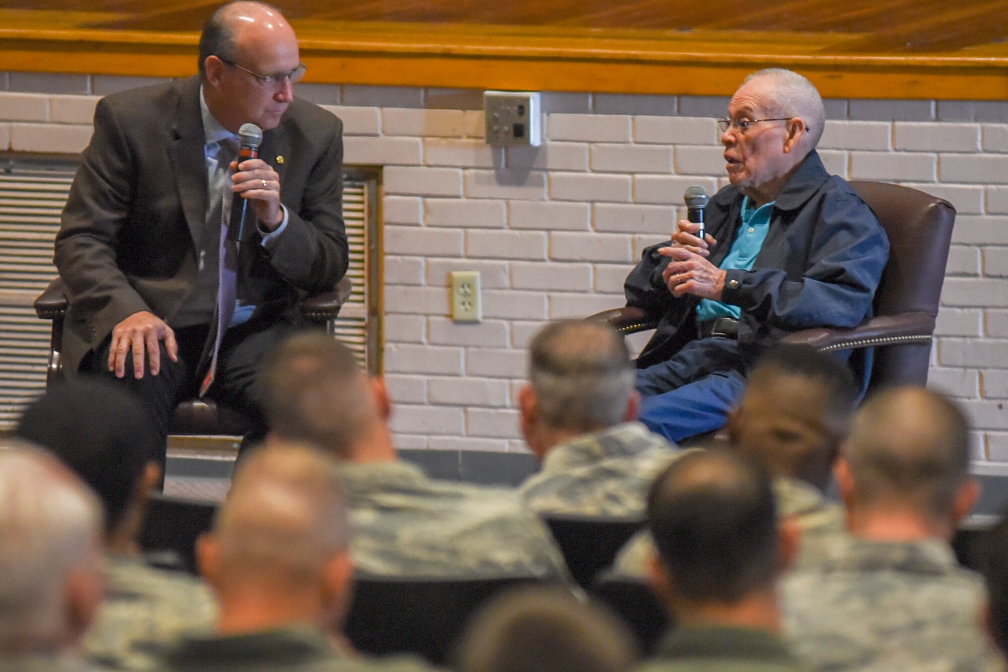 Eddie Graham, right, retired Army sergeant, speaks to Airmen at McConnell Air Force Base, Kan., Oct. 20, 2016. Graham gave a speech about how his experiences during World War II and surviving the Bataan Death March. (U.S. Air Force photo/Senior Airman Christopher Thornbury)