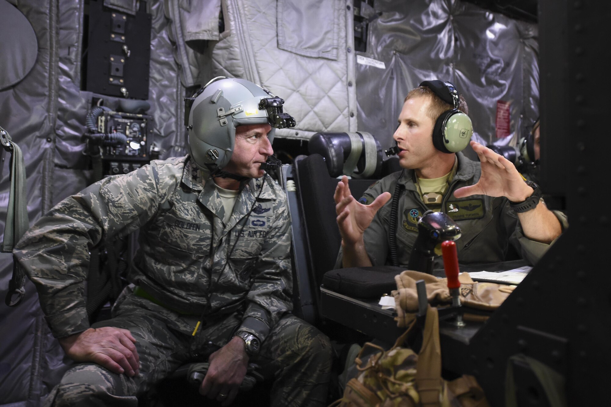 Maj. Travis Tucker, fire control officer with the 4th Special Operations Squadron, explains an AC-130U Spooky gunship’s weapons systems to Air Force Chief of Staff Gen. David L. Goldfein during Spooky mission orientation flight at Hurlburt Field, Fla., Oct. 19, 2016. Goldfein was the keynote speaker at the Special Tactics Memorial dedication ceremony at the Hurlburt Field Air Park. During their visit, Goldfein and his wife, Dawn, met with AFSOC, 505th Command and Control Wing, and base leadership and personnel. (U.S. Air Force photo by Senior Airman Jeff Parkinson)