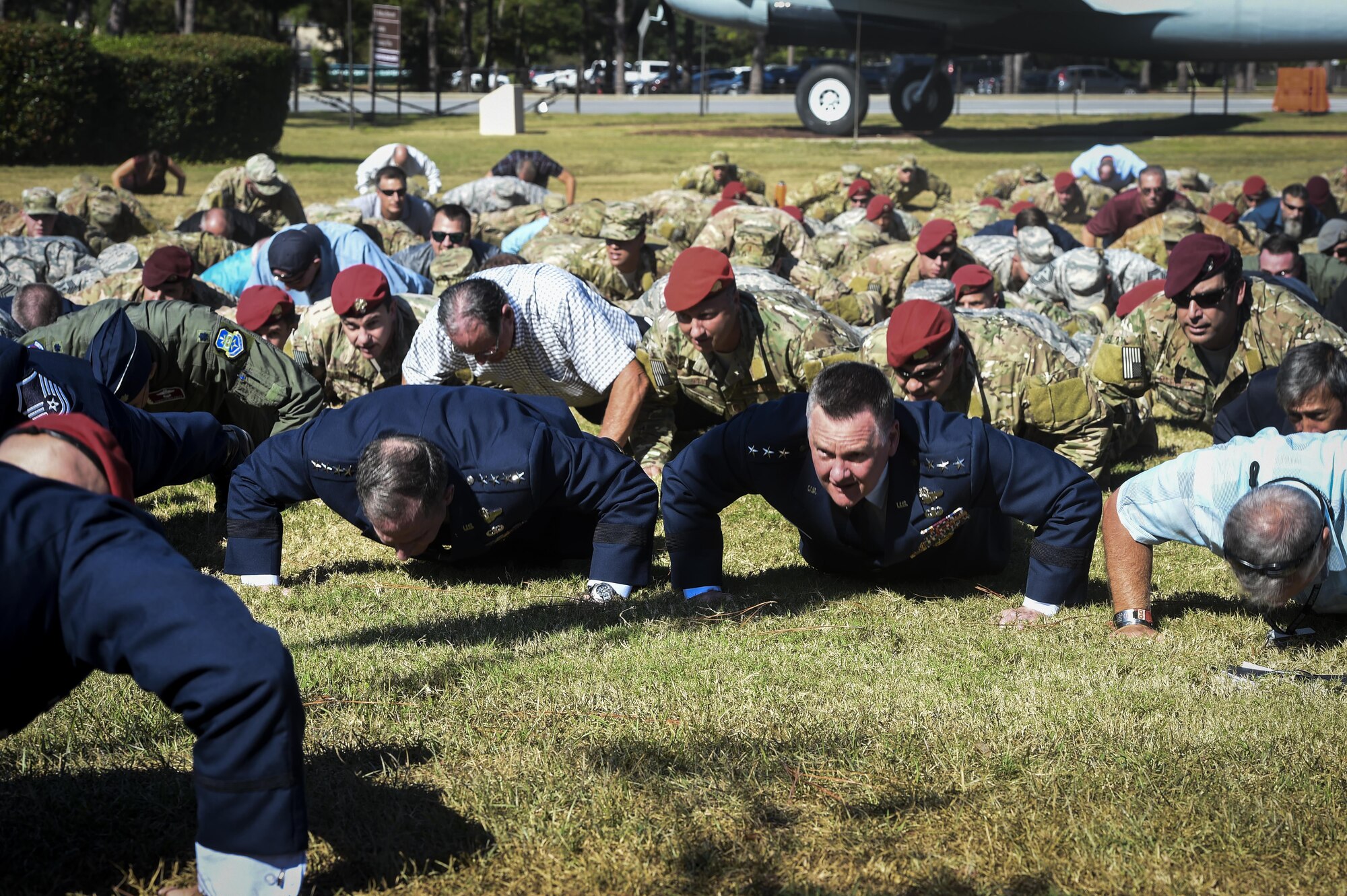 Air Force Chief of Staff David L. Goldfein and Lt. Gen. Brad Webb, the commander of Air Force Special Operations Command, perform memorial push-ups following the Special Tactics Memorial dedication ceremony at Hurlburt Field, Fla., Oct. 20, 2016. Goldfein was the keynote speaker for the ceremony. In addition to the ceremony, he met with Air Force Special Operations Command leadership, 505th Command and Control Wing personnel and Air Commandos around base. (U.S. Air Force photo by Senior Airman Jeffrey Parkinson)