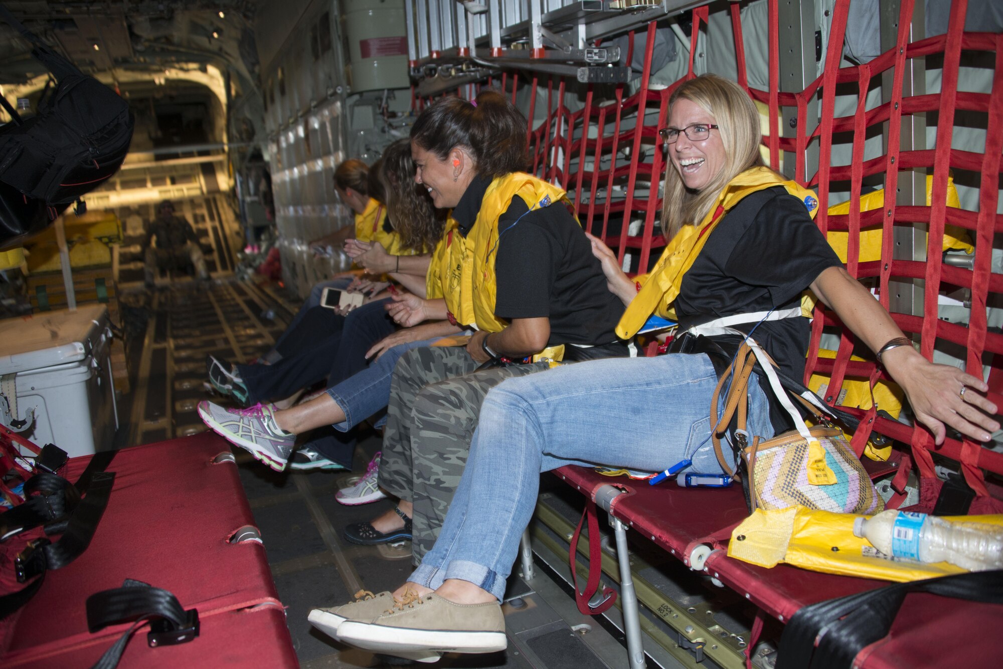 Spouses from the 353rd Special Operations Group received a familiarization flight on a MC-130J Commando II. The 353rd SOG hosted a day of activities at Kadena Air Base to honor military spouses, Oct. 6, 2016. (U.S. Air Force photo by Capt. Jessica Tait)
