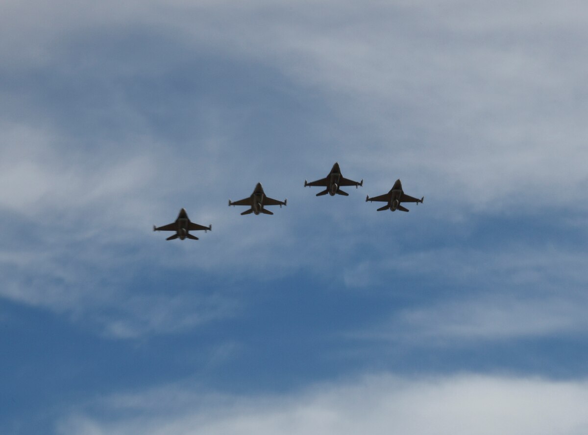 MILLER, S.D. - F-16s of the South Dakota Air National Guard do a missing man formation flyby during the funeral to repatriate fallen World War II U.S. Air Force pilot, 1st Lt. Ben Barnes at the GAR cemetery in Miller, S.D. Oct. 15, 2016.  The unit participates in flyby and flyovers when requested and designated by higher headquarters.(U.S. Air National Guard photo by Senior Master Sgt. Nancy Ausland/Released)