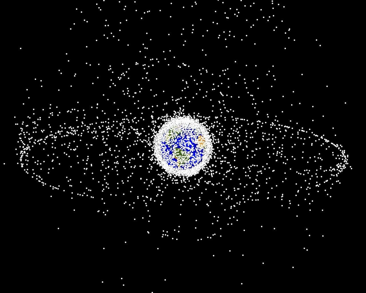 This image of objects and debris in geosynchronous orbit is generated from a distant oblique vantage point to provide a good view of the object population in the geosynchronous region, about 22,000 miles from Earth. The larger population of objects over the Northern Hemisphere is due mostly to Russian objects in high-inclination, high-eccentricity orbits. NASA image