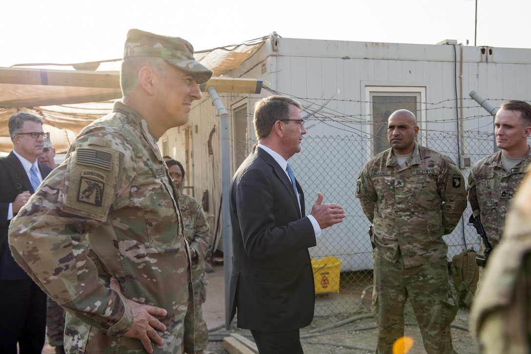 Defense Secretary Ash Carter and Army Lt. Gen. Stephen Townsend, commander of Combined Joint Task Force-Operation Inherent Resolve, talk with members of the 101st Airborne Division in Irbil, Iraq, Oct. 23, 2016. DoD photo by Air Force Tech. Sgt. Brigitte N. Brantley