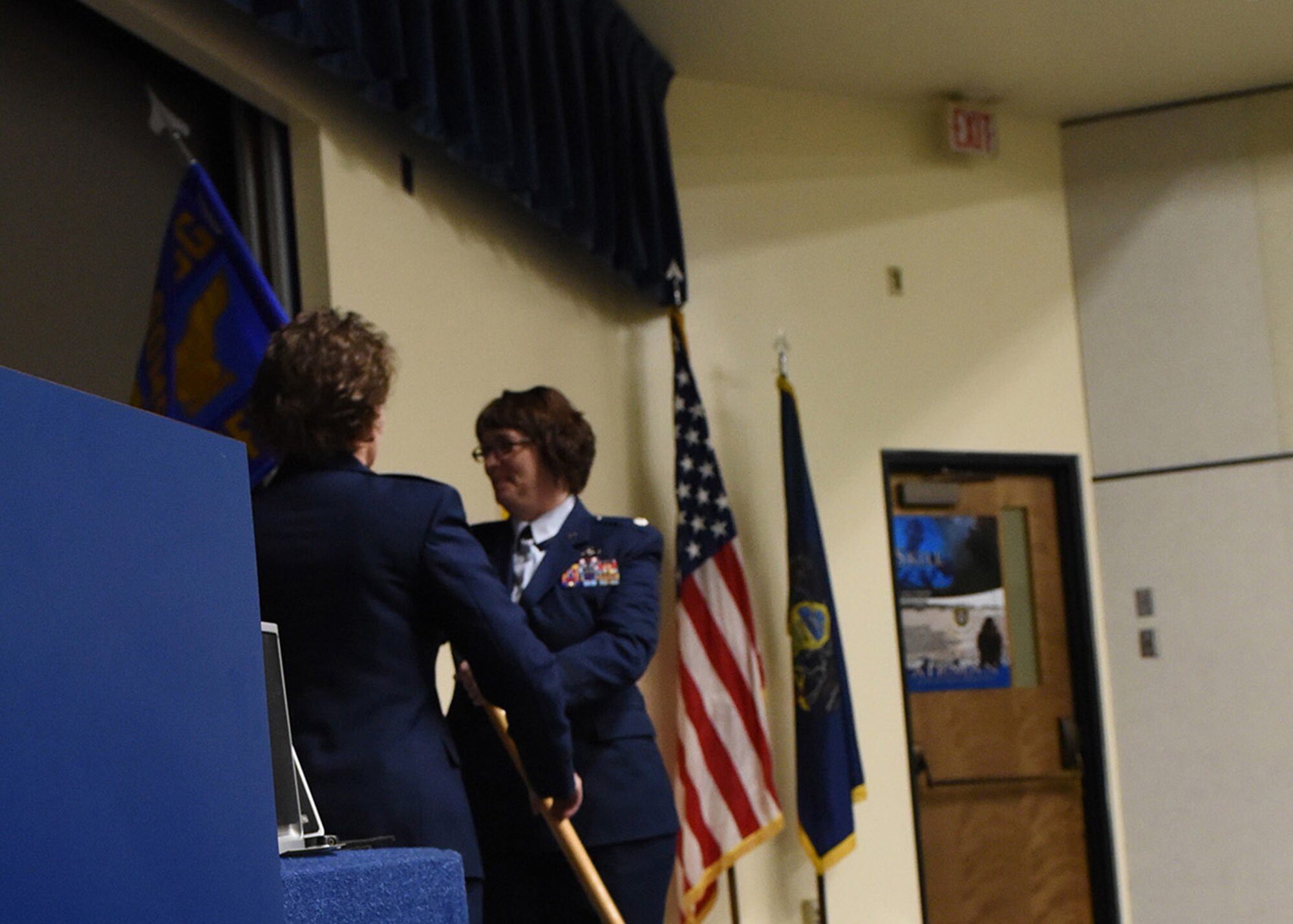 During an assumption of command ceremony Oct. 22 at the 193rd Special Operations Wing, Middletown, Pennsylvania, Lt. Col. Susan Garrett (left), 193rd Special Operations Mission Support Group commander, presented the guidon to Lt. Col. Angela Stateler, appointing her as the new 193rd Special Operations Force Support Squadron commander. The ceremony began with preliminary honors and ended with the symbolic passing of the guidon. (U.S. Air National Guard photo by Airman 1st Class Julia Sorber/Released)