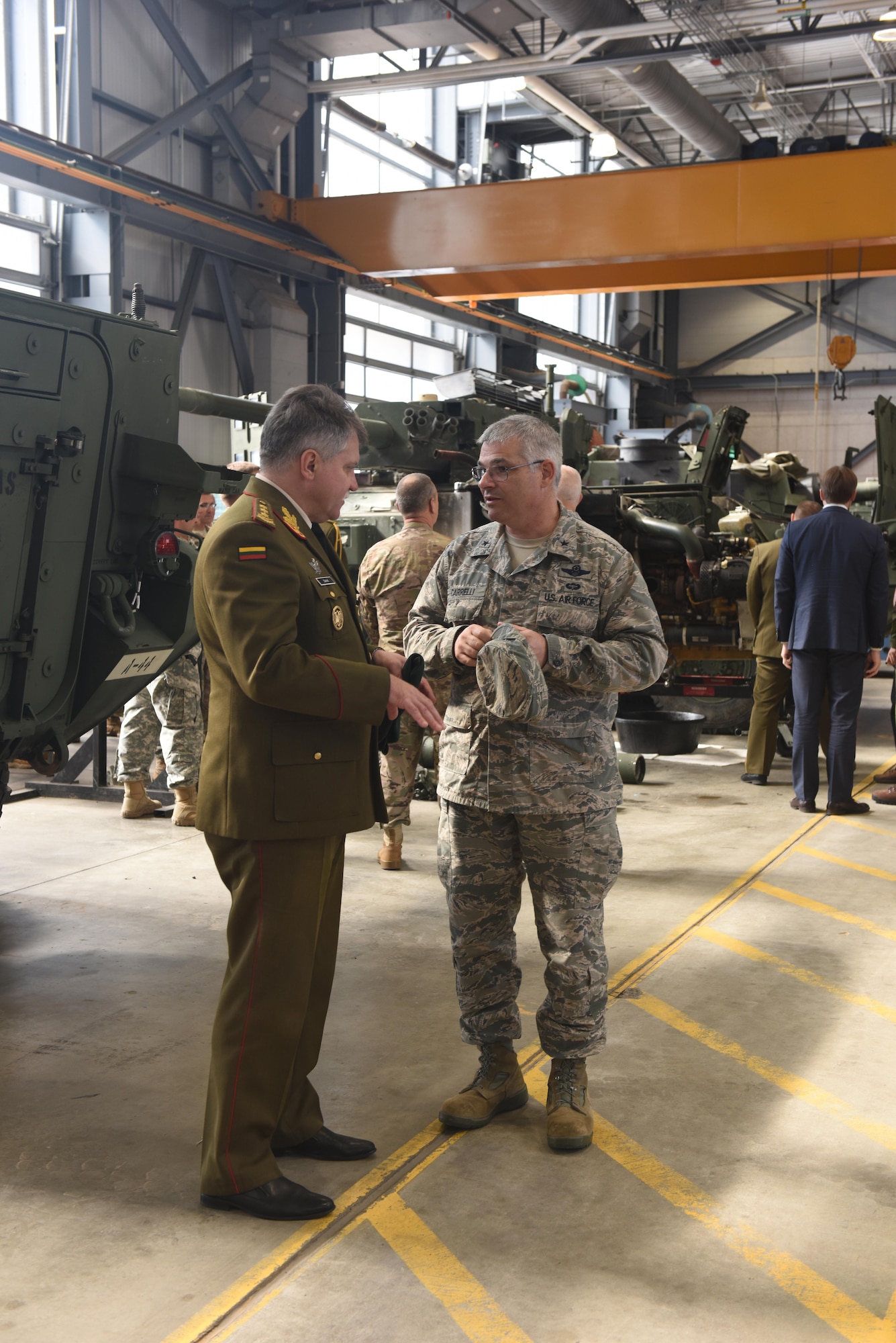 Lt. Gen. Jonas Vytautas Zukas (left), chief of defense of Lithuania, and Brig. Gen. Tony Carrelli, adjutant general, Pennsylvania National Guard, discuss the PANG’s Stryker vehicle Oct. 15 during a tour of the Eastern Army National Guard Aviation Training Site at Fort Indiantown Gap, Annville, Pa. The PANG and Lithuanian officials spent the day fostering a state-country partnership that began in 1993. (U.S. Air National Guard photo by Tech. Sgt. Claire Behney/Released)
