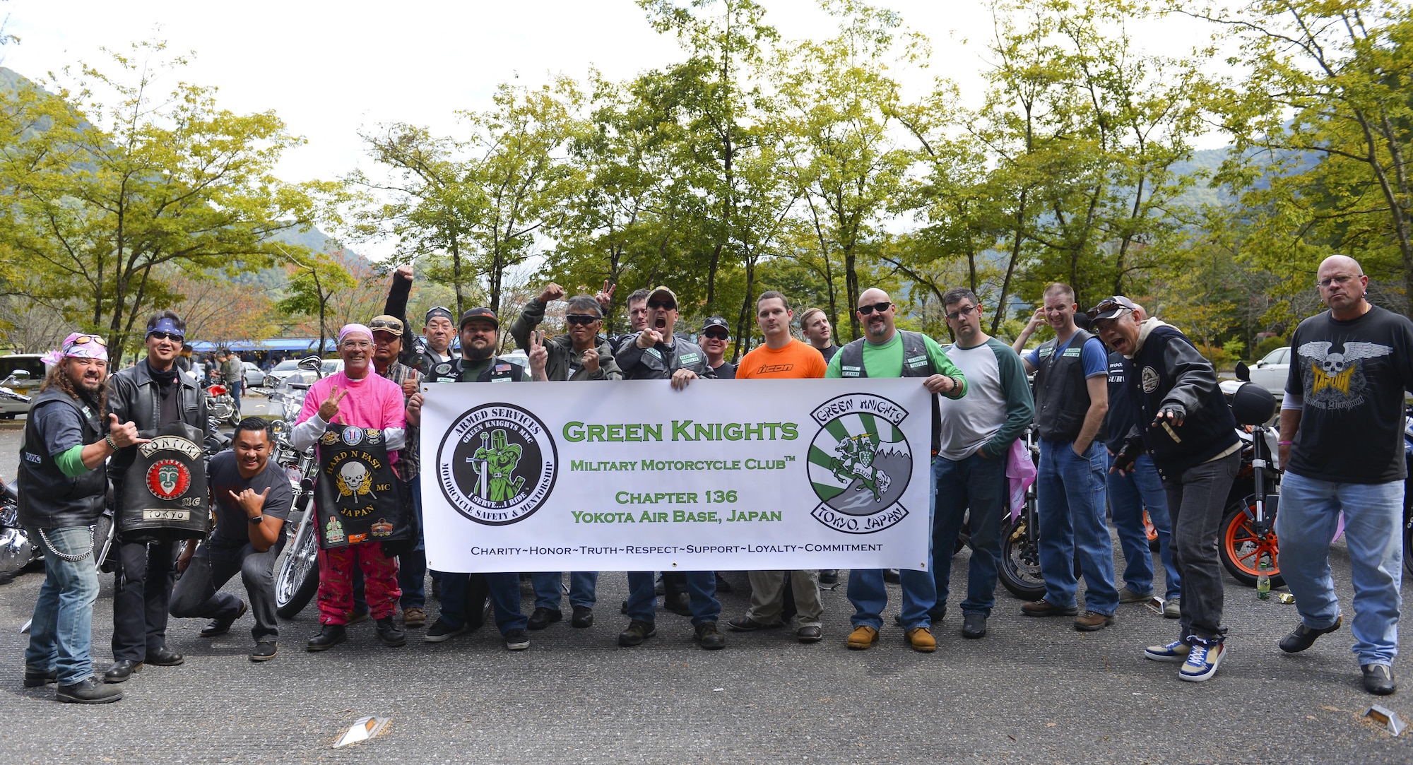 Participant in the Green Knights Military Motorcycle Club Chapter 136 inaugural breast cancer awareness ride, “Bikers for Boobies,” pose together at Okutama prefecture, Japan, Oct. 16, 2016. The Green Knights invited motorcyclists from on base as well as the local Japanese community to ride together and donate towards breast cancer research, raising nearly $1000. (U.S. Air Force photo by Airman 1st Class Elizabeth Baker/Released)