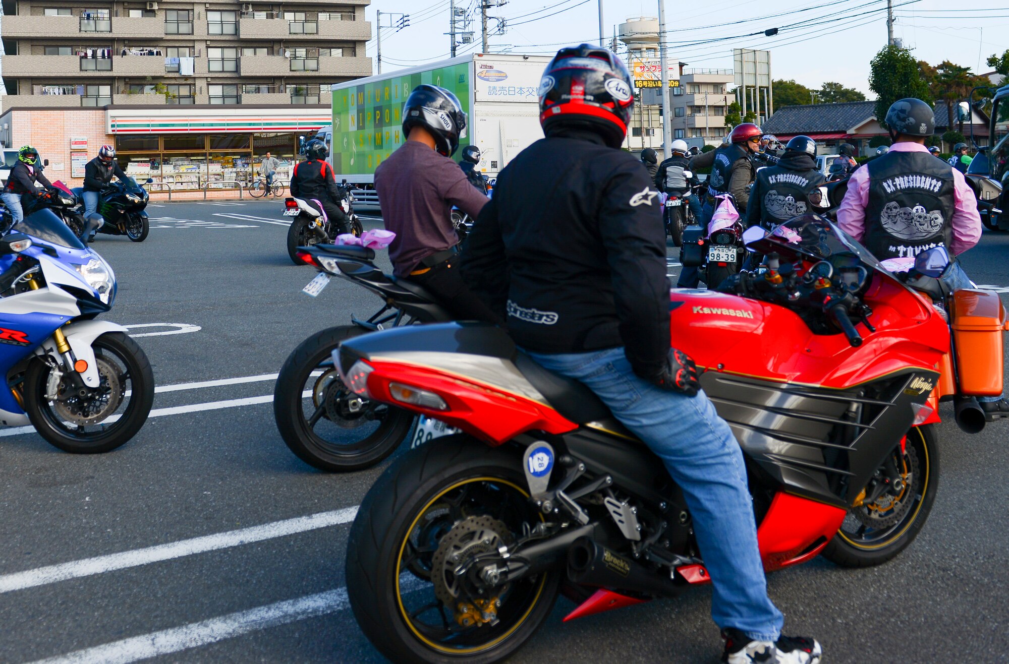 Members of the Green Knights Military Motorcycle Club Chapter 136 and guest riders begin the inaugural breast cancer awareness ride, “Bikers for Boobies,” at Tokyo, Japan, Oct. 16, 2016. The Green Knights, a motorcycle mentorship and riding club, hosts charity events and mentorship rides to develop riding skills among motorcyclists of all levels and to give back to the community. (U.S. Air Force photo by Airman 1st Class Elizabeth Baker/Released)