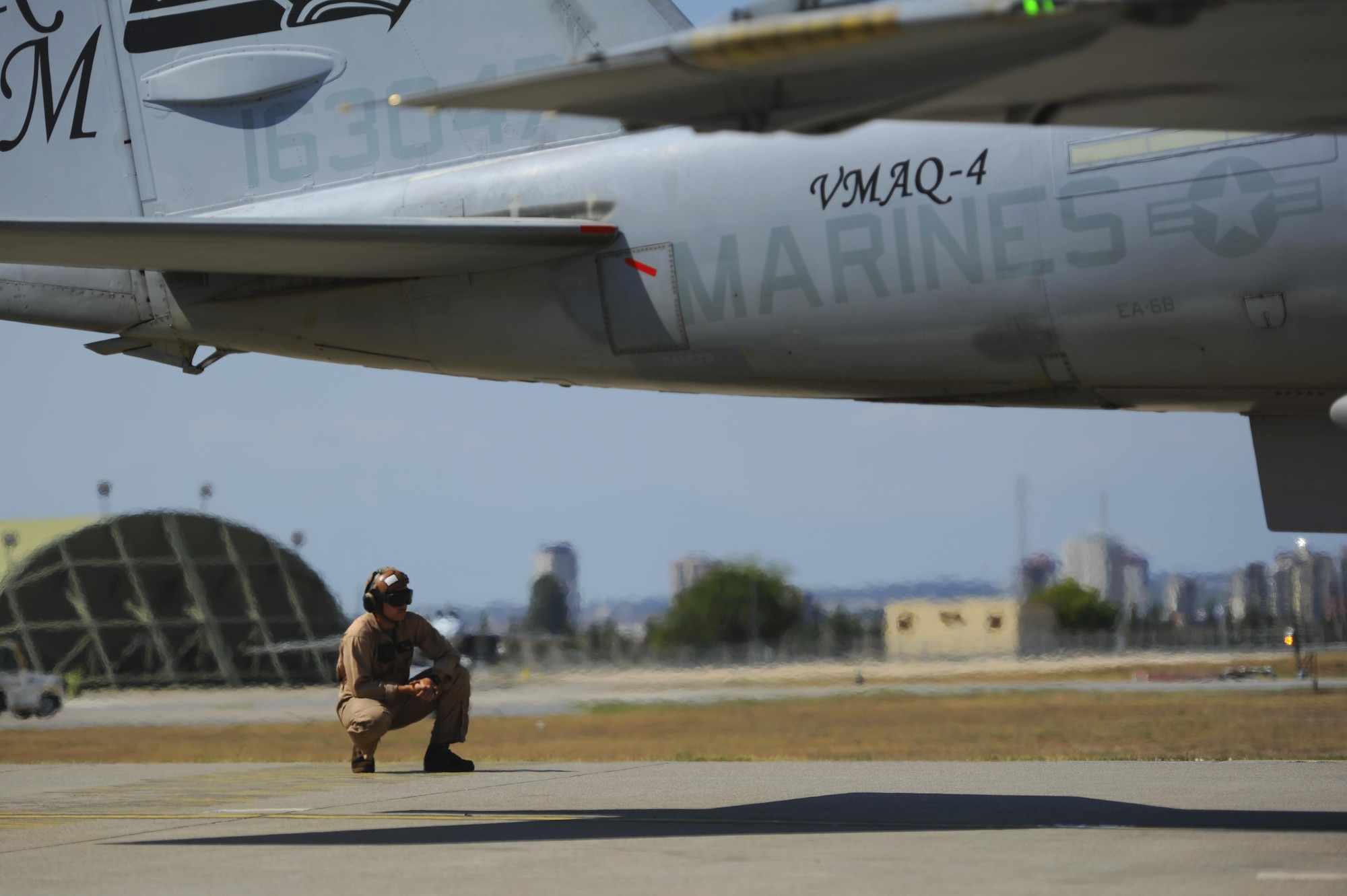 U.S. Marine Corps Cpl. Bradley Kogut, Tactical Electronic Warfare Squadron 4 plane captain and collateral duty inspector, monitors a preflight inspection Sept. 16, 2016, at Incirlik Air Base, Turkey. Preflight inspections are done to ensure all of the moving surfaces on the aircraft are functioning properly prior to takeoff. (U.S. Air Force photo by Airman 1st Class Devin M. Rumbaugh)