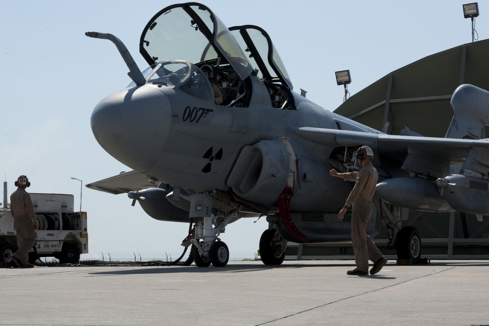 U.S. Marine Corps Cpl. Kogut Bradley, Tactical Electronic Warfare Squadron 4 plane captain, signals for pre-engine start-up, Sept. 16, 2016 at Incirlik Air Base, Turkey. Hand signals are used in communication between pilots and plane captains for pre and post-flight functions. (U.S. Air Force photo by Staff Sgt. Ciara Gosier)
