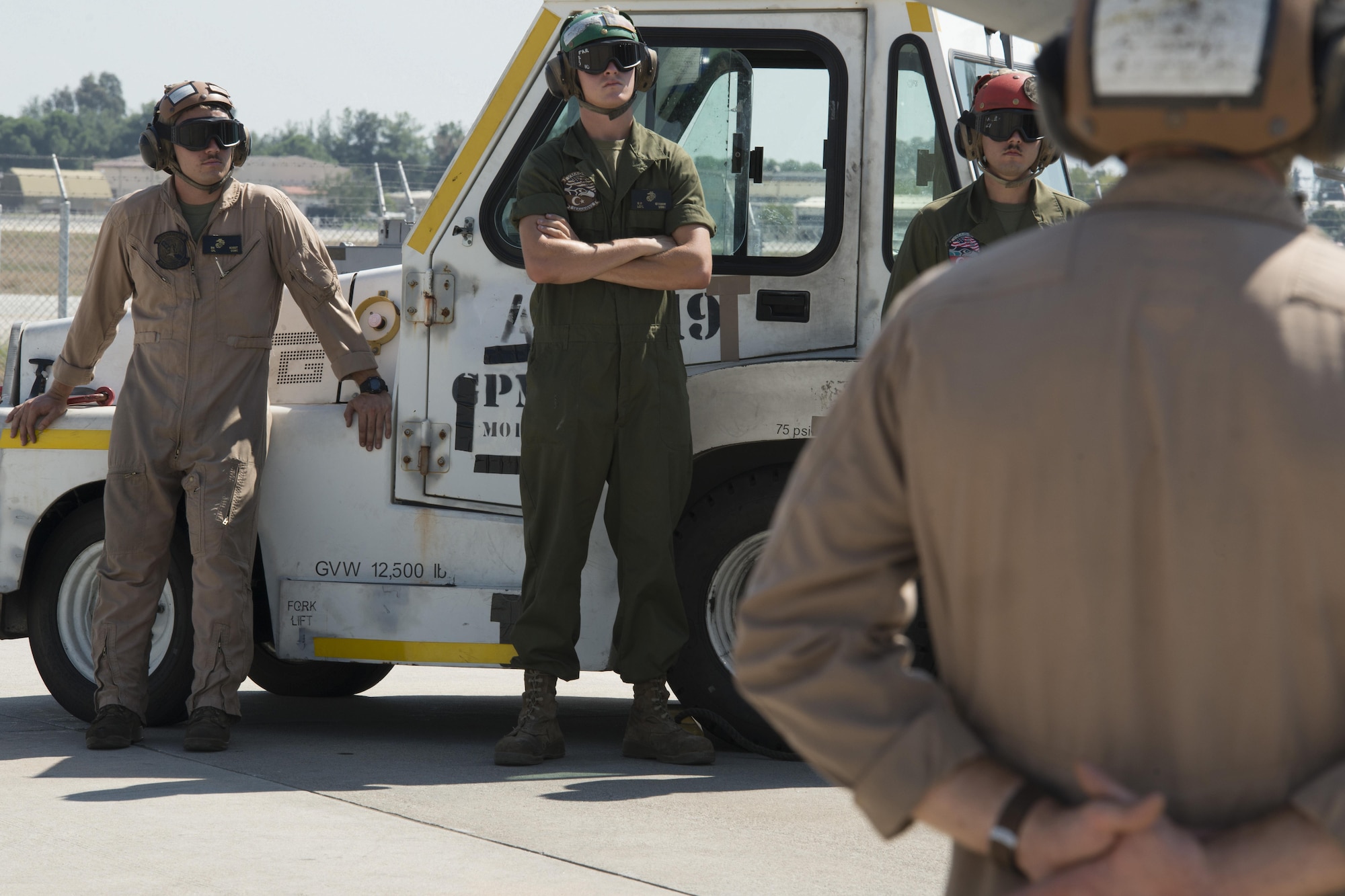 U.S. Marine Corps Tactical Electronic Warfare Squadron 4, gear runners, wait for signal to begin pre-flight process at Incirlik Air Base, Turkey, Sept. 16, 2016. Gear runners provide hot bleed air from mobile start-up units before engines are run. (U.S. Air Force photo by Staff Sgt. Ciara Gosier)
