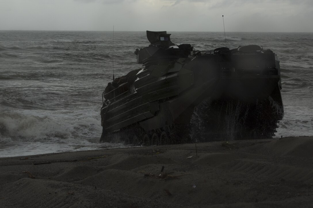 U.S. and Philippine Marines in an assault amphibious vehicle land on a Subic Bay, Philippines, beach during Philippine Amphibious Landing Exercise 33 (PHIBLEX), Oct. 7, 2016.  PHIBLEX is an annual U.S-Philippine military bilateral exercise that combines amphibious capabilities and live-fire training with humanitarian civic assistance efforts to strengthen interoperability and working relationships. (U.S. Marine Corps photo by Lance Cpl. Nelson Duenas/Released)