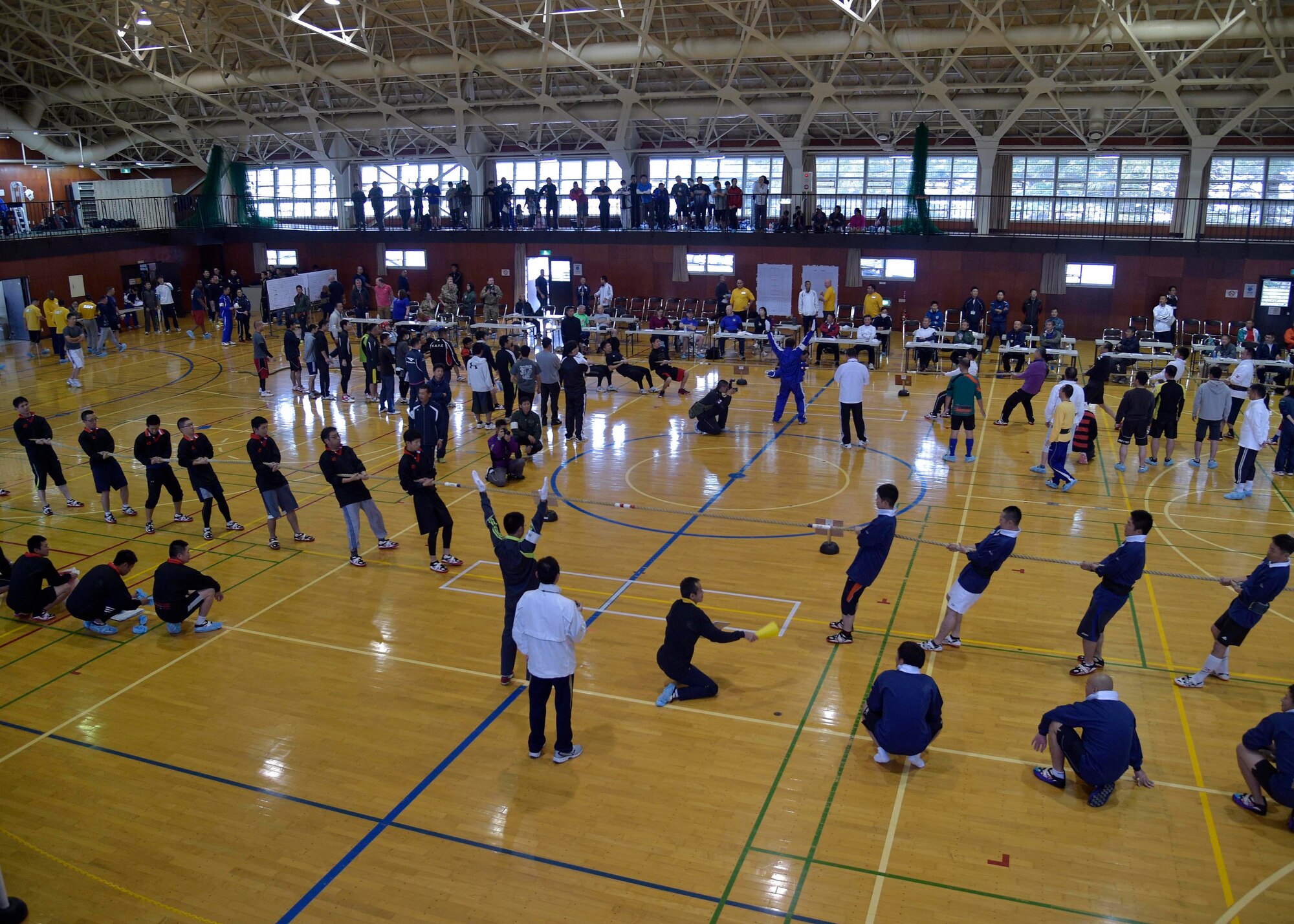Participants of the 15th Annual Northern Air Defense Force Commander’s Cup compete throughout the Japan Air Self-Defense Force gym, at Misawa Air Base, Japan, Oct. 22, 2016. This tug-of-war event showcased the partnership and friendship between JASDF, U.S. Air Force, U.S. Navy and Royal Air Force military personnel. RAF joined the event due to their presence here for Guardian North 16, the first-ever bilateral exercise with JASDF. (U.S. Air Force photo by Senior Airman Deana Heitzman)