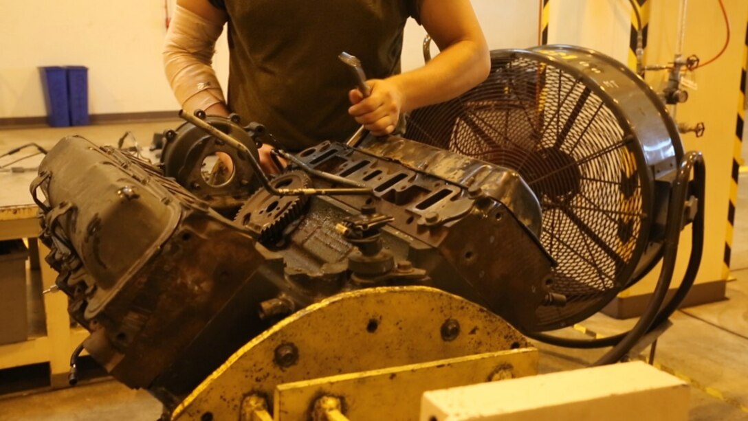 A Marine with General Support Maintenance Company on Camp Kinser, Okinawa, Japan, October 7, 2016. GSM repairs all secondary repairable items that cycle through III Marine Expeditionary Force. Because of the III MEF’s high operational tempo and the different environments they expose gear to, GSM Co is in high demand, according to Staff Sgt. Patrick Hubbard. Hubbard, a native of Albany, New York, is an ordinance chief with 3rd Maintenance Battalion, 3rd Marine Logistics Group, III Marine Expeditionary Force. (U.S. Marine Corps photo by Cpl. Natalie Dillon/Released)