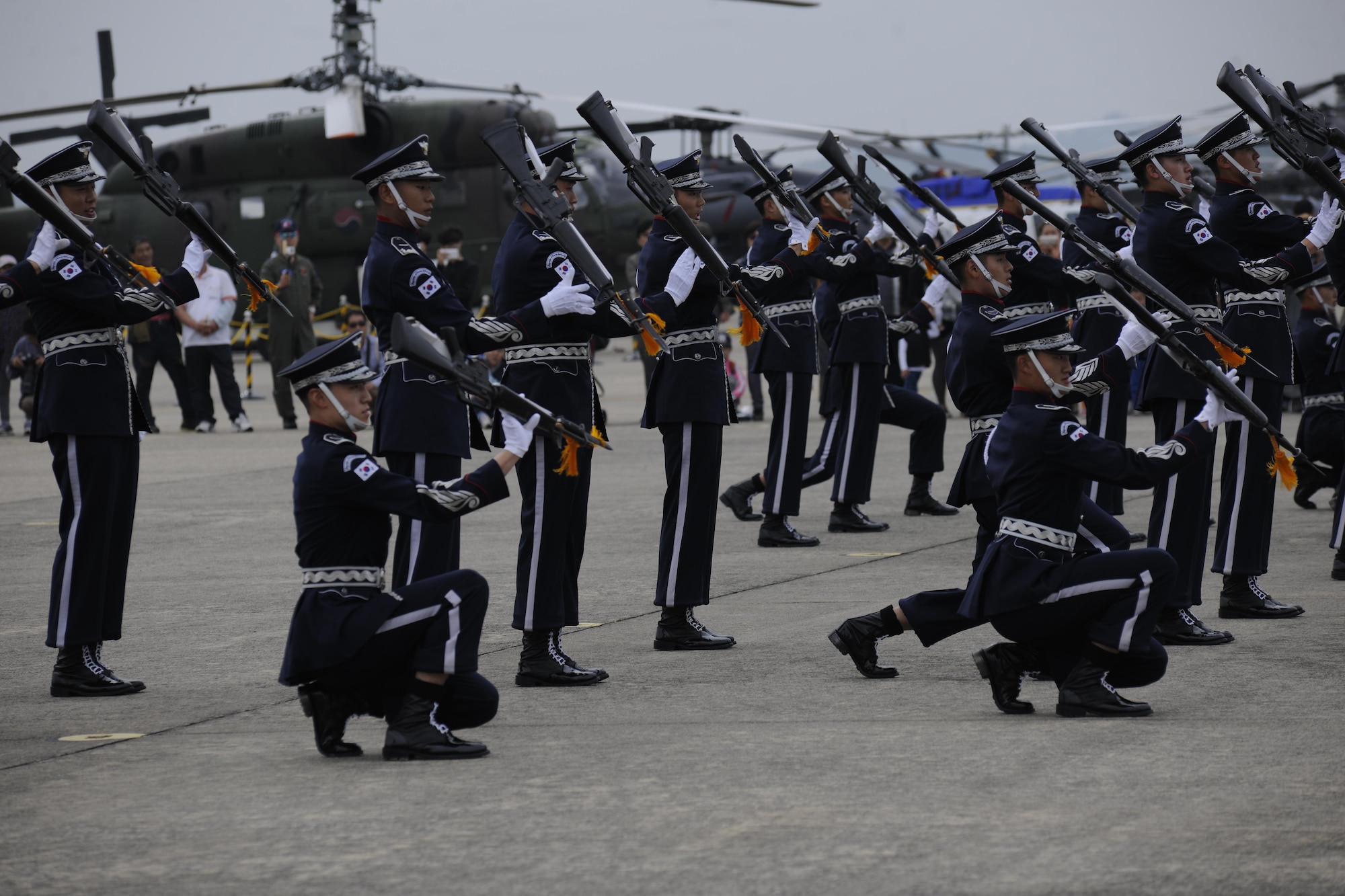 A military honor guard performs at the opening ceremony of the Sacheon Airshow at Sacheon Base, Republic of Korea, Oct. 20, 2016. 7th Air Force provided both an F-16 and A-10 Thunderbolt II static display for the four-day airshow, showcasing U.S. Air Force capabilities to over 260,000 attendees. (U.S. Air Force photo by 1st Lt. Lauren Linscott/Released)