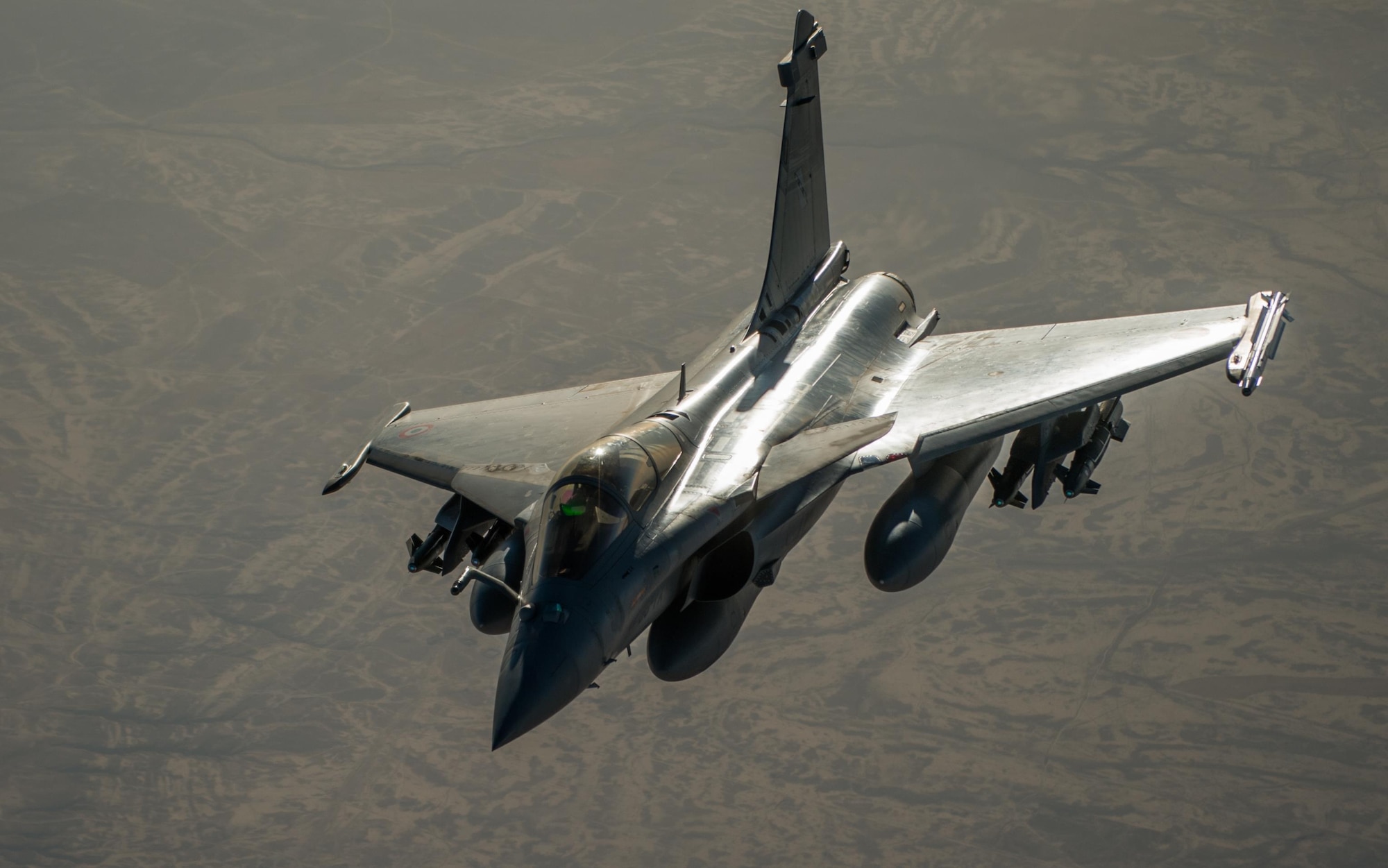A French air force Rafale approaches a KC-135 Stratotanker over Iraq in support of Operation Inherent Resolve Oct 17, 2016. The operational mission of Operation Inherent Resolve is to militarily defeat Da'esh in the Combined Joint Operation Area in order to enable whole-of-coalition governmental actions to increase regional stability. (U.S. Air Force photo by Staff Sgt. Douglas Ellis/Released)