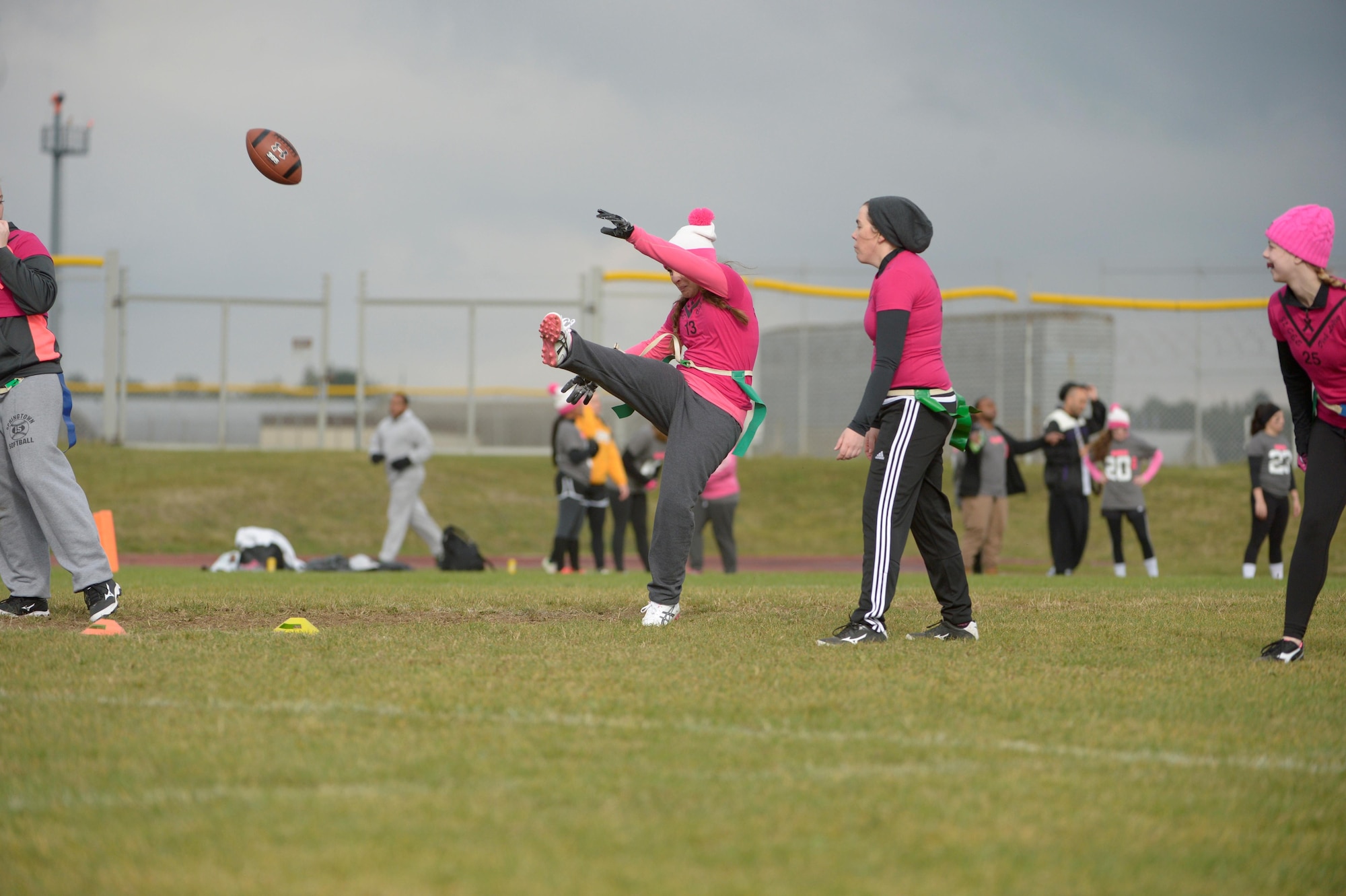 Airmen and family members from the 52nd Fighter Wing participated in a flag football game at the 2016 Combined Federal Campaign-Overseas kickoff Oct. 15, 2016, at Spangdahlem Air Base, Germany. The campaign offers people an opportunity to donate money to more than 2,600 national, international and public philanthropic organizations. (U.S. Air Force photo by Staff Sgt. Jonathan Snyder)