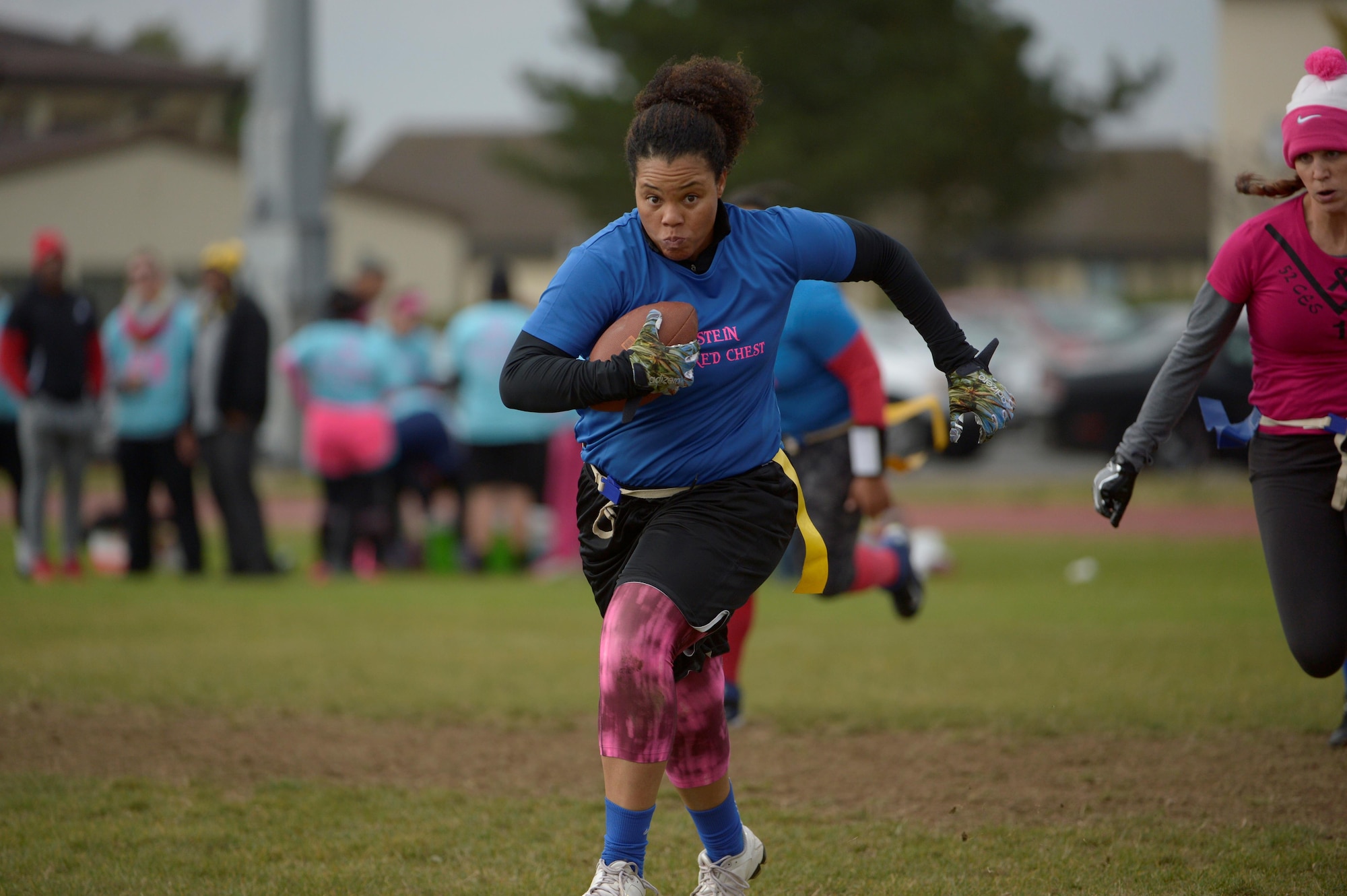 Airmen and family members from the 52nd Fighter Wing participated in a flag football game at the 2016 Combined Federal Campaign-Overseas kickoff Oct. 15, 2016, at Spangdahlem Air Base, Germany. CFC has more than 200 campaigns throughout the world to help to raise millions of dollars for eligible non-profit organizations each year. (U.S. Air Force photo by Staff Sgt. Jonathan Snyder)
