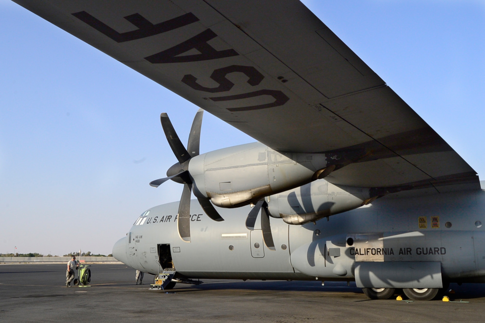 A C-130J Super Hercules assigned to the 737th Expeditionary Airlift Squadron sits on the ramp at an undisclosed location in Southwest Asia prior to a mission to Qayyarrah West Airfield, Iraq, Oct. 21, 2016. The 737th EAS flew the first coalition mission into the airfield since the start of Operation Inherent Resolve. (U.S. Air Force photo by Staff Sgt. Aaron Richardson/Released)