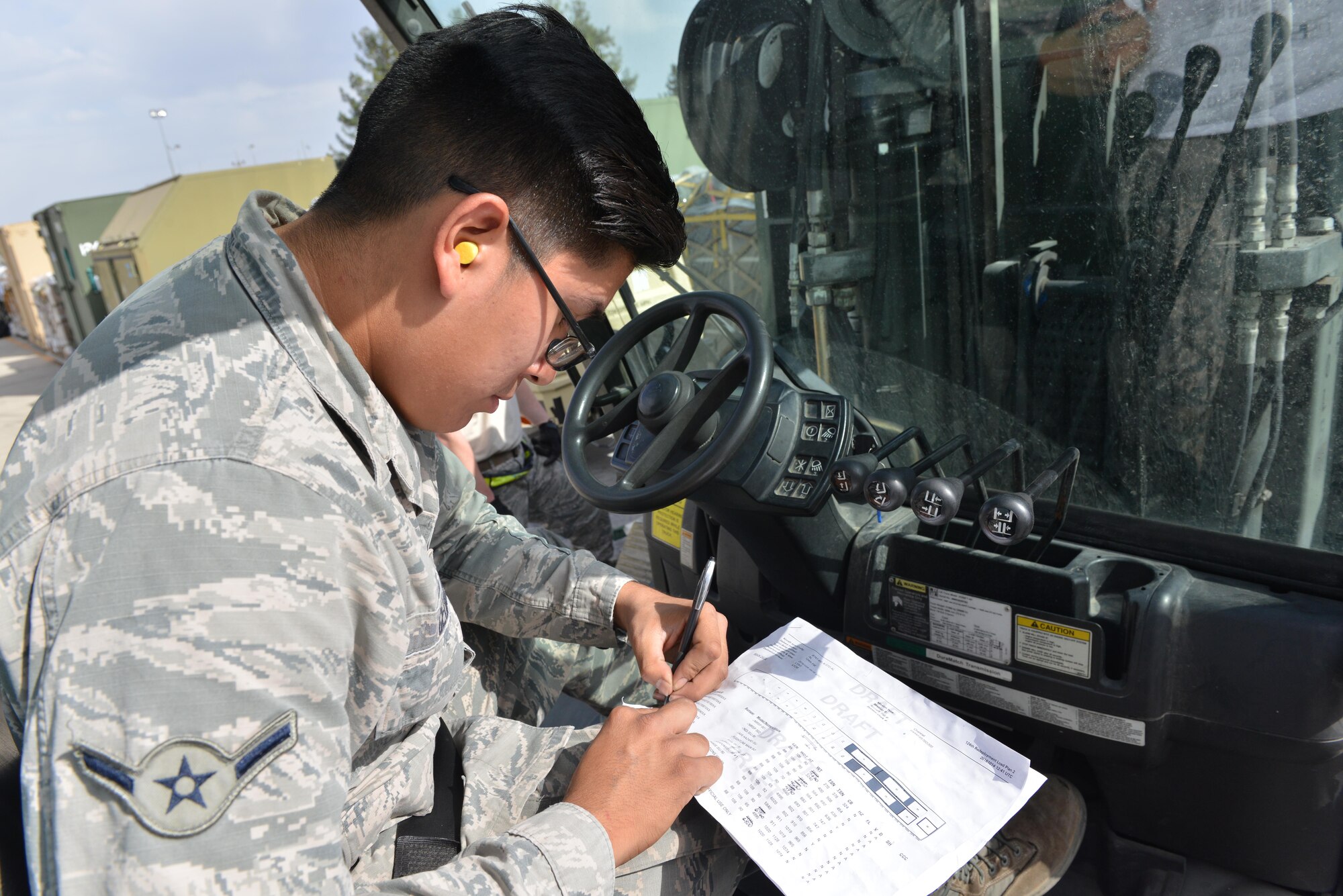 U.S. Air Force Airman Kyle George, 728th Air Mobility Squadron air transportation journeyman, annotates cargo weight on a load plan Oct. 18, 2016, at Incirlik Air Base, Turkey. The load plan contains information such as tracking numbers, cargo quantity and weight. (U.S. Air Force photo by Senior Airman John Nieves Camacho)