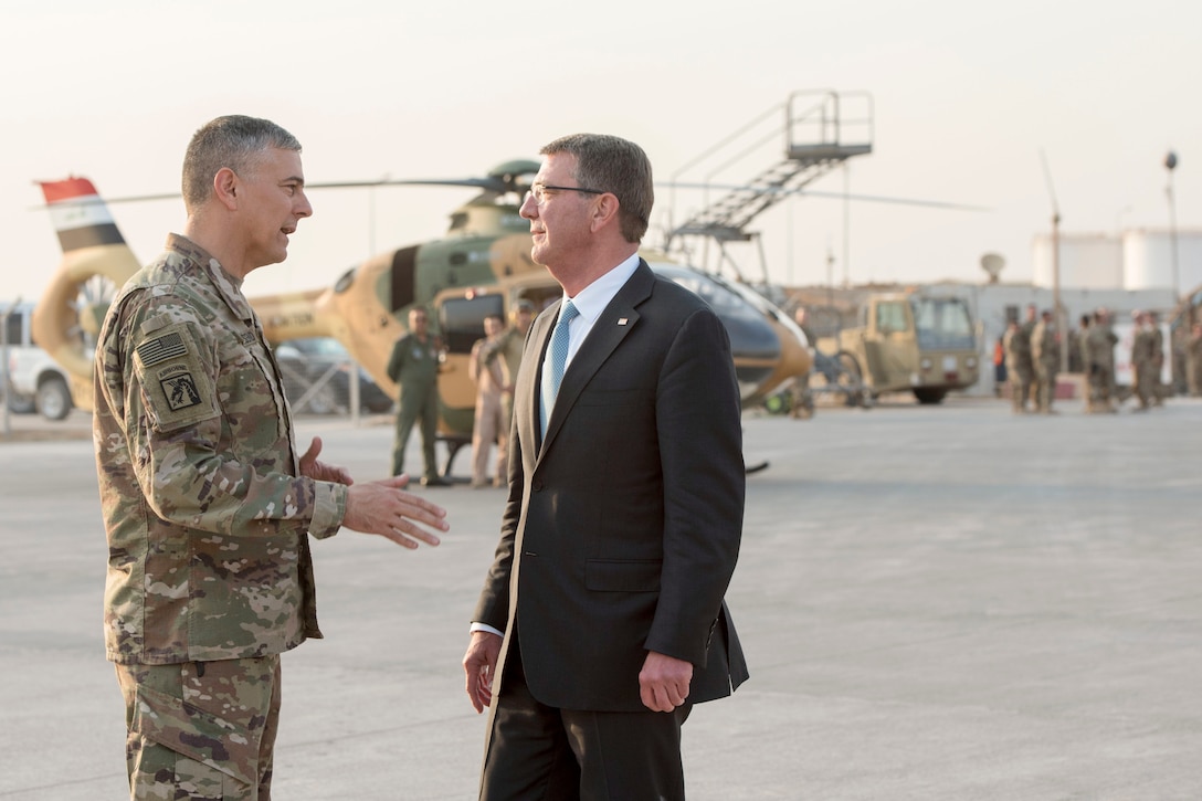 Secretary of Defense Ash Carter and U.S. Army Lt. Gen. Stephen Townsend, commander of Combined Joint Task Force-Operation Inherent Resolve, say farewell in Erbil, Iraq, Oct. 23, 2016. (DoD photo by U.S. Air Force Tech. Sgt. Brigitte N. Brantley)