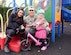 Lt. Col. Brandon Sokora, center, the 100th Civil Engineer Squadron commander, poses for a photo with his wife Lindsay and youngest daughter Aliya, 3, Oct. 19, 2016, on Royal Air Force Mildenhall, England. Aliya was born a congenital amputee, without her left lower arm, and in 2011 Sokora was diagnosed with multiple sclerosis. October is National Disability Employment Awareness Month and the 100th CES commander shared his and his daughter’s story at a lunch celebrating the many varied contributions of America’s workers with disabilities. (U.S. Air Force photo/Karen Abeyasekere)