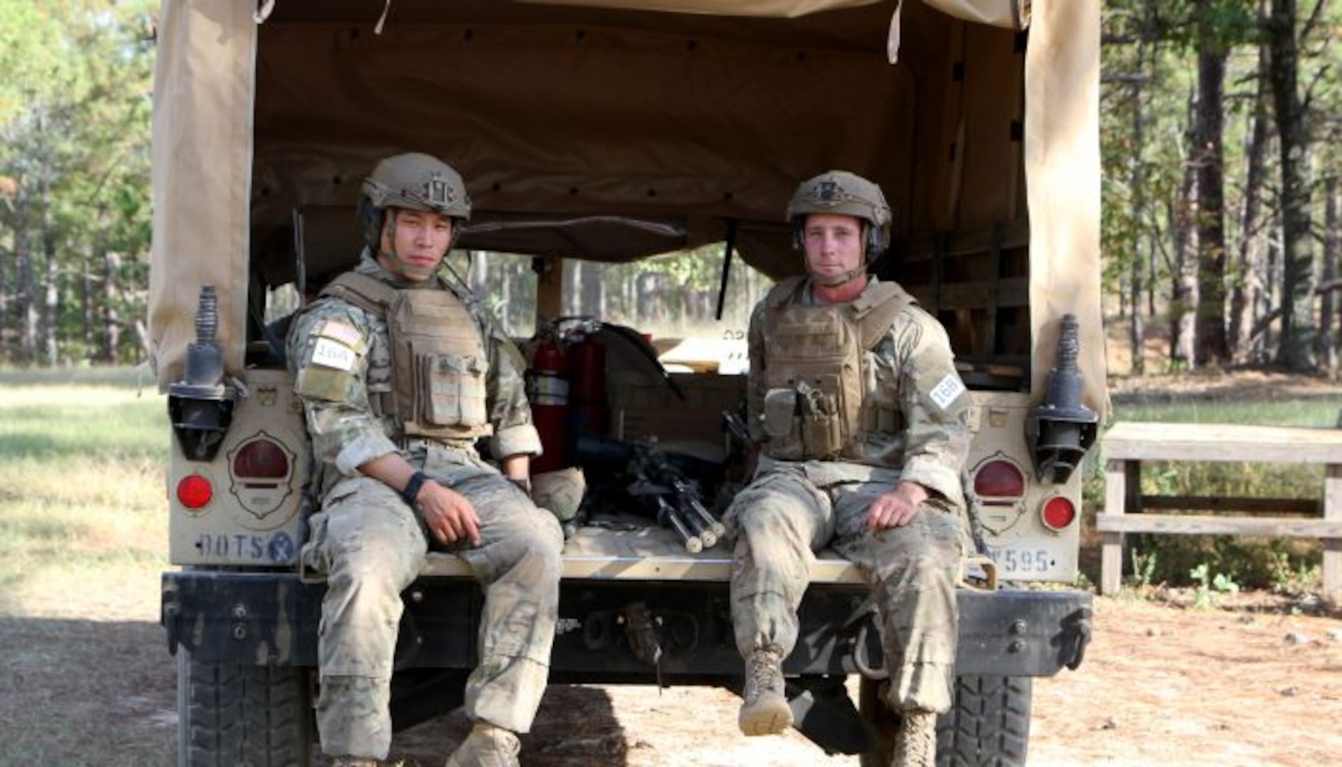 Michigan National Guard's Sgt. Saykham Keophalychanh and Sgt. Nicholas Mitchell of Headquarters Company, 3rd Battalion, 126th Infantry Regiment, wait their turn on the “Moving Target” event of Fort Benning’s International Sniper Competition. 

