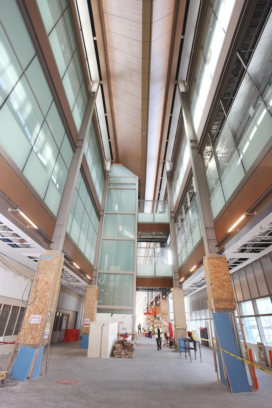 The quarter-mile long Concourse at the Department of Veteran Affairs Replacement Medical Center that is under construction in Aurora, Colorado serves as a central connector for clinic buildings, diagnostic and treatment centers, in-patient buildings, a chapel, and more. When complete, the 1.2 million square-foot and three parking garages with 2,242 spaces will serve more than 400,000 veterans and their families in the Colorado area.