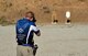 U.S. Air Force 2nd Lt. Casey Ryan, 55th Security Forces Squadron Officer-in-Charge of Logistics, fires at silhouette targets place inside of a berm at the Eastern Nebraska Gun Club on Sept. 28 in Louisville, Neb.  Ryan represents the Air Force as he travels throughout the United States at competition shooting contests.  (U.S. Air Force photo by Josh Plueger)