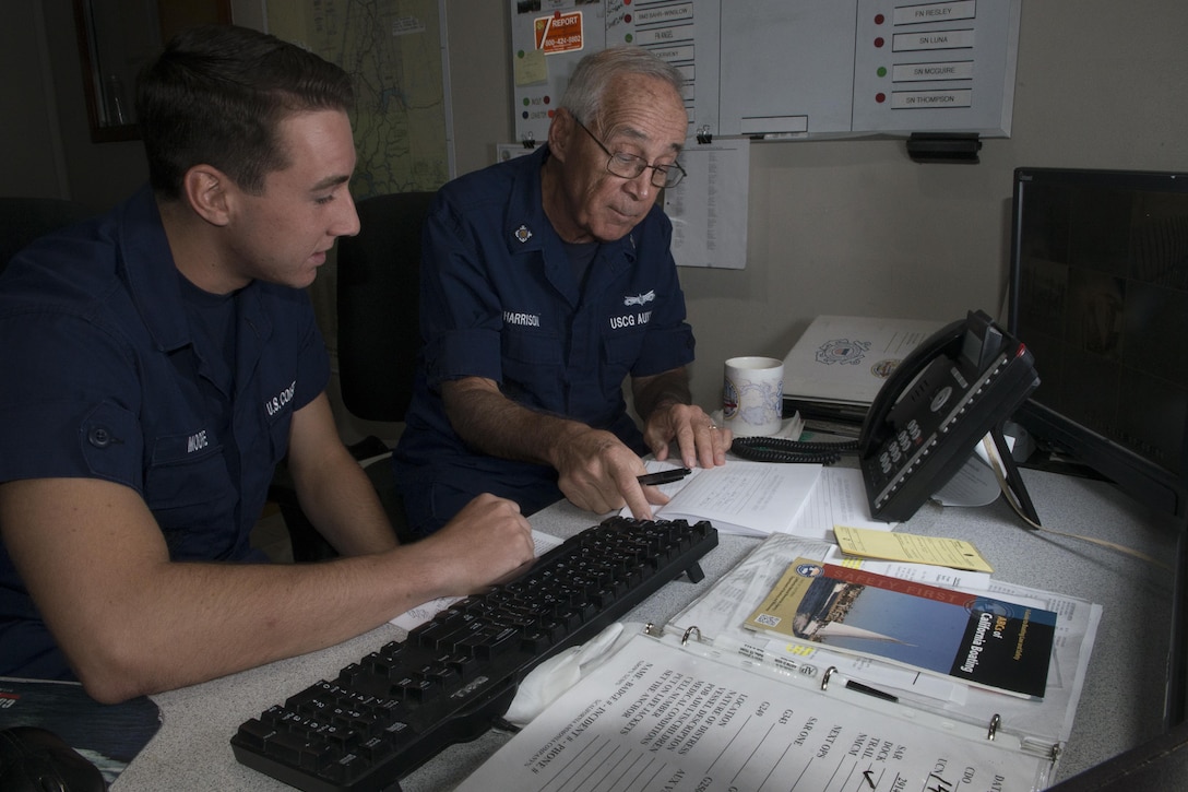 An Auxiliarist conducts communication watchstander at Coast Guard Station Rio Vista. Station Rio Vista's
crew is responsible for 1,500 miles of navigable waterways in the Bay Area
Delta Region. (Coast Guard photo by Petty Officer 3rd Class Loumania
Stewart)
