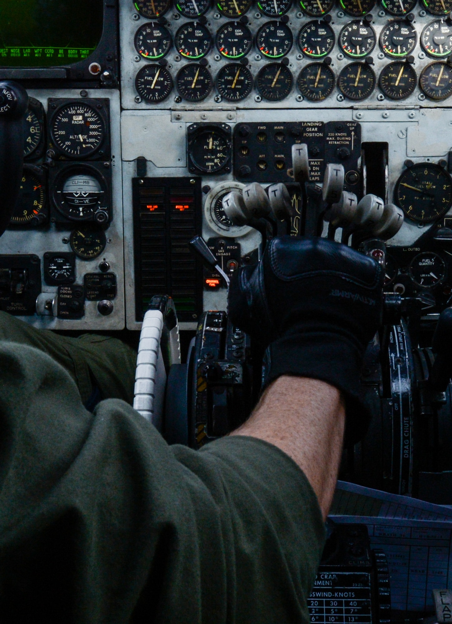 Capt. Lance Adsit, 20th Bomb Squadron aircraft commander, presses forward on the throttles of a B-52 Stratofortress during an integration flight above the Gulf of Mexico Oct. 13, 2016. The integration was the capstone event of a six-month training course, involving extensive communication planning across more than 10 agencies within the bomber community, followed by a live-fly exercise with two B-1 Lancers from Dyess Air Force Base, Texas, and two B-52s from Barksdale. U.S. Air Force photo/Senior Airman Curt Beach)