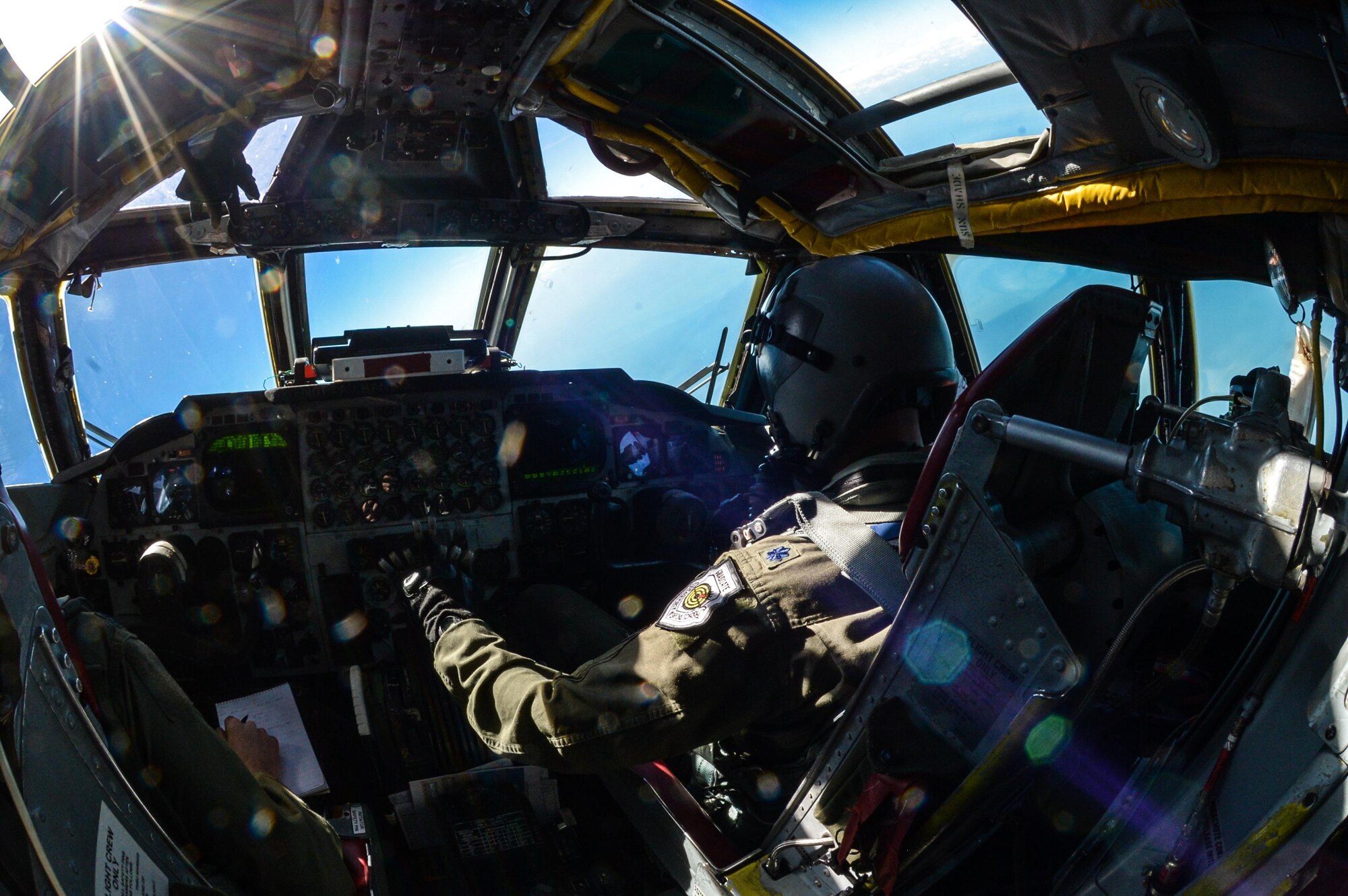 Lt. Col. Erik Johnson, 340th Weapons Squadron commander, presses forward on the throttles of a B-52 Stratofortress during a training mission above the Gulf of Mexico Oct. 13, 2016. Two B-52s from Barksdale Air Force Base, La., and two B-1 Lancers from Dyess Air Force Base, Texas, flew together and performed more than 200 simulated missile launches as part of a weapons school integration exercise. (U.S. Air Force photo/Senior Airman Curt Beach)