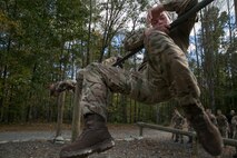 Royal Marine Thomas Bradbury, 43 Fleet Protection Group Royal Marines, attempts to get over the first obstacle at The Basic School’s obstacle course before taking on the endurance course during Exercise Tartan Eagle 16 Phase II, aboard Marine Corps Base Quantico, Va., Oct. 22. Tartan Eagle Phase II is the continuation of a bilateral exercise involving Marines and sailors from Marine Corps Security Forces and their British counterparts, the 43 FPGRM.  The Marines and sailors from Marine Corps Security Forces took this opportunity to show the Royal Marines the rigors of the TBS obstacle and endurance course.