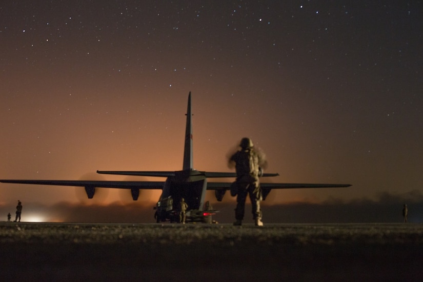 An Air Force C-130J Super Hercules waits to unload logistical supplies in support of the fight for Mosul at Qayyarah West Airfield, Iraq, Oct. 22, 2016. Control of the airfield has enabled the opening of an air corridor to support operations throughout northern Iraq. Army photo by Spc. Christopher Brecht