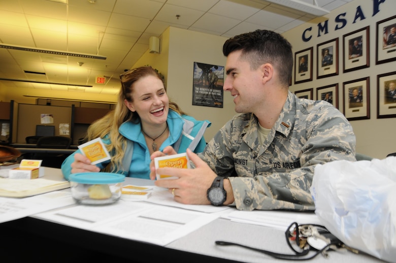 Carrie Rose and 2nd Lt. Patrick Almquist, 4th Space Operations Squadron, participate in a question and answer skill-building exercise during the Intimate Allies workshop at Schriever Air Force Base, Colorado, Thursday, Oct. 20, 2016. Throughout the workshop, couples participated in hands-on lessons and intimacy exercises, including scenario discussions and a physical intimacy exercise. (U.S. Air Force photo/2nd Lt. Darren Domingo)