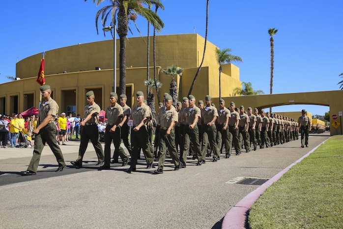 Marines from Echo Company, 2nd Recruit Training Battalion, march to meet families and friends prior to beginning liberty call at Marine Corps Recruit Depot San Diego, Oct. 20. After the Marines were released, they were allowed six hours of on-base liberty before graduation on Friday. Annually, more than 17,000 males recruited from the Western Recruiting Region are trained at MCRD San Diego. Echo Company is scheduled to graduate Oct. 21.
