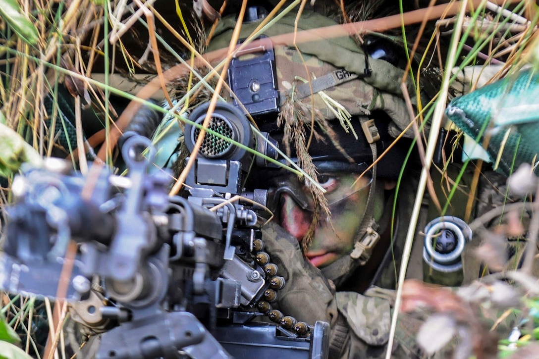 Army Pfc. Benjamin Grasso scans his sectors of fire during Strong Shield, an exercise in Panevezys, Lithuania, Oct. 22, 2016. Grasso is assigned to Company A, 2nd Battalion, 503rd Infantry Regiment (Airborne), 173rd Infantry Brigade Combat (Airborne). Lithuania hosted the exercise to test the nation’s ability to work with different internal and external agencies. Army photo by Staff Sgt. Corinna Baltos