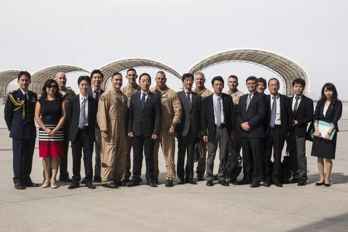 Japanese and American leaders pose for a group photo at Marine Corps Air Station (MCAS) Yuma, Arizona, Oct. 24, 2016. This event gave Yoshihiko Fukuda, mayor of Iwakuni City, Japan, an idea of what to expect of the aircraft following the scheduled basing of Marine Fighter Attack Squadron (VMFA) 121 at MCAS Iwakuni. After its transition, VMFA-121 will be the first F-35B squadron stationed in Japan.