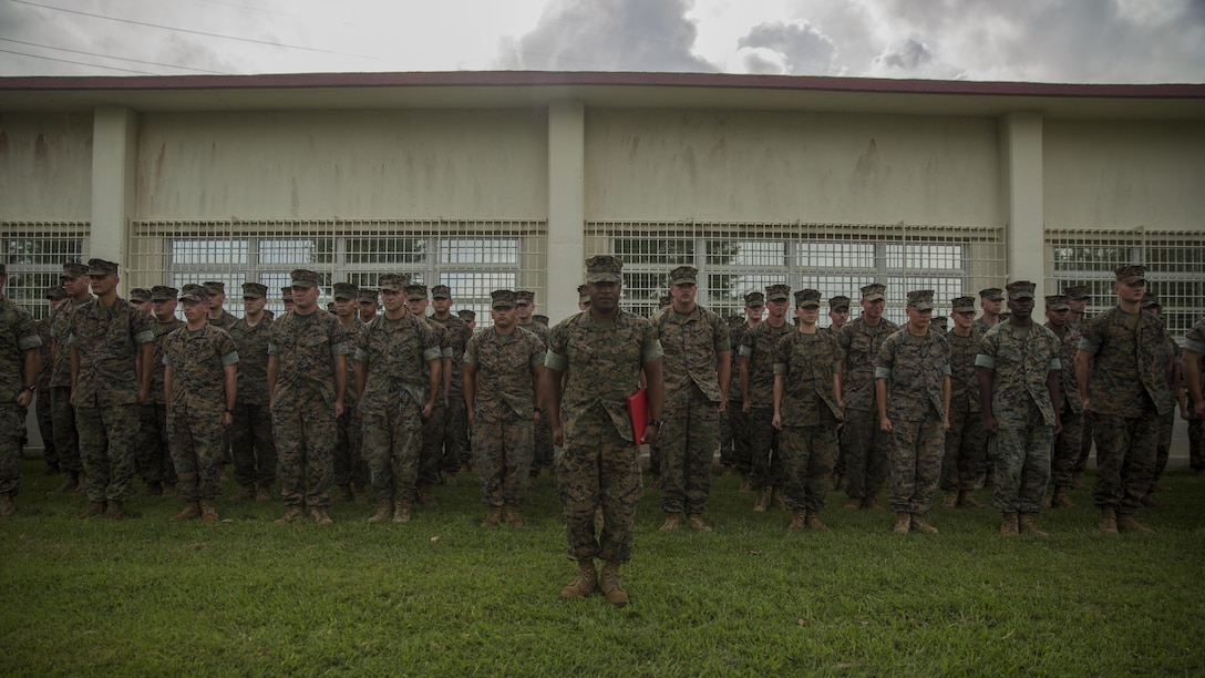 U.S. Marine Sgt. Maj. Mario Fields stands in front of a formation on Camp Courtney, Okinawa, to recognize Marines recieving awards after the end of Philippine Amphibious Landing Exercise 33 (PHIBLEX), Oct. 20, 2016. PHIBLEX is an annual U.S.-Philippine military bilateral exercise that combines amphibious capabilities and live-fire training with humanitarian civic assistance efforts to strengthen interoperability and working relationships. Fields is the sergeant major of 3d Marine Expeditionary Brigade. (U.S. Marine Corps photo by Sgt. Kathy Nunez/Released)