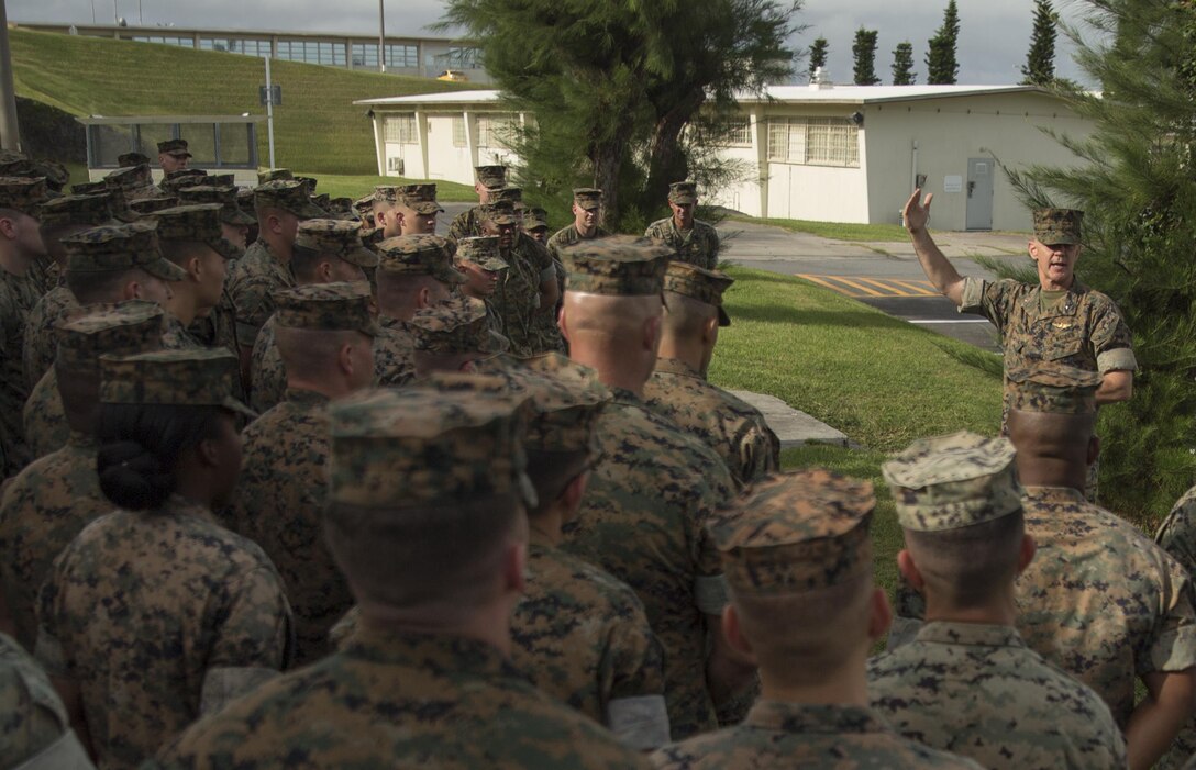 U.S. Marine Brig. Gen. John Jansen speaks with 3d Marine Expeditionary Brigade Marines after an awards ceremony held on Camp Courtney, Okinawa, to congratulate supporting members of Philippine Amphibious Landing Exercise 33 (PHIBLEX), Oct. 20, 2016. PHIBLEX is an annual U.S.-Philippine military bilateral exercise that combines amphibious capabilities and live-fire training with humanitarian civic assistance efforts to strengthen interoperability and working relationships. Jansen is the commanding general of 3d MEB. (U.S. Marine Corps photo by Sgt. Kathy Nunez/Released)