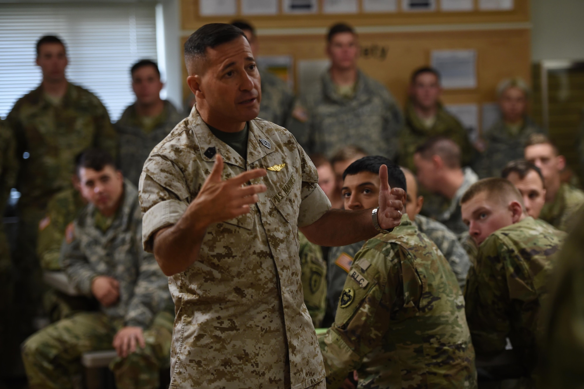 Marine Corps Sgt. Maj. Anthony Spadaro, U.S. Pacific Command senior enlisted leader, talks to soldiers at the Noncommissioned Officer Academy, at Joint Base Elmendorf-Richardson, Alaska, Oct. 19, 2016. Spadaro, a native of New Brunswick, New Jersey visited JBER for a three day immersion tour Oct. 19 to 21, 2016. Spadaro provides the PACOM commander with the enlisted perspective on theater security cooperation, encouraging peaceful development, responding to contingencies, and deterring aggression throughout the Indo-Asia-Pacific region. This was his first visit to Alaska. 