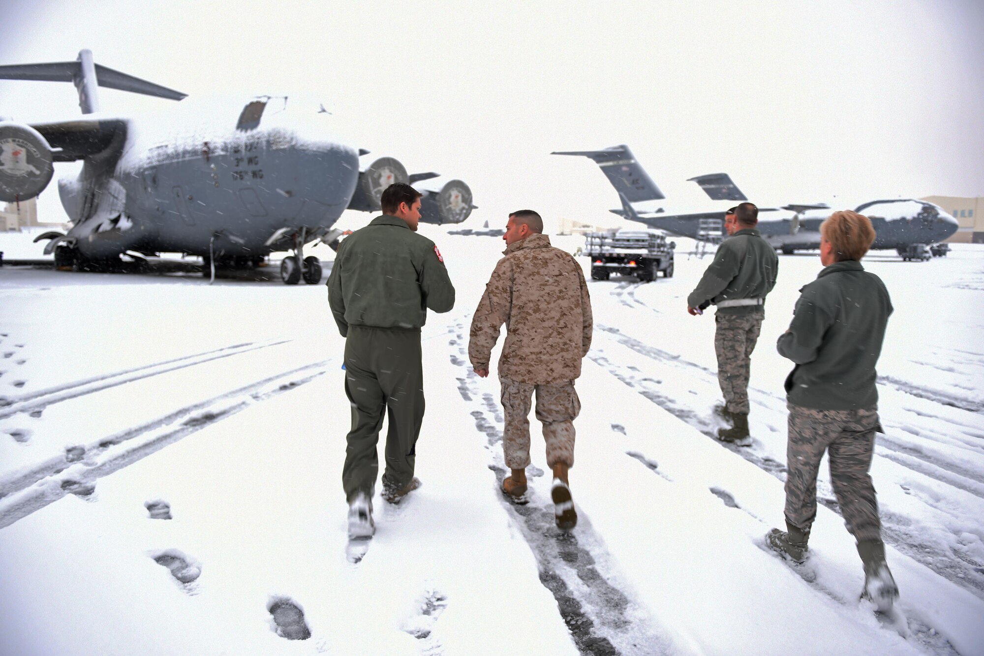 Marine Corps Sgt. Maj. Anthony Spadaro, U.S. Pacific Command senior enlisted leader, prepare to tour C-17 Globemaster III, at the flightline at Joint Base Elmendorf-Richardson, Alaska, Oct. 21, 2016. Spadaro, a native of New Brunswick, New Jersey visited JBER for a three day immersion tour Oct. 19 to 21, 2016. Spadaro provides the PACOM commander with the enlisted perspective on theater security cooperation, encouraging peaceful development, responding to contingencies, and deterring aggression throughout the Indo-Asia-Pacific region. This was his first visit to Alaska. 