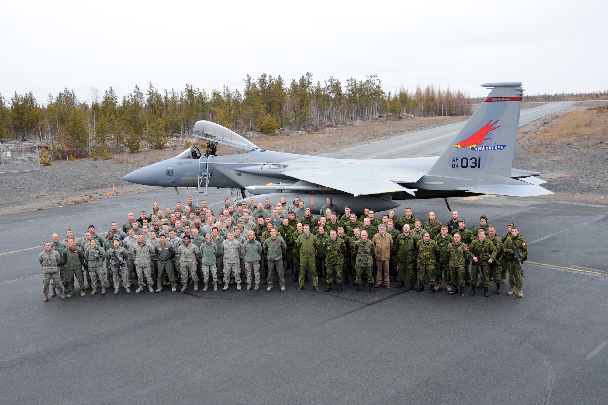 Participants of Exercise Vigilant Shield 2017, Yellowknife, Northwest Territories, pose for a group photo Oct. 21, 2016.  During this exercise, forces supporting North American Aerospace Defense Command (NORAD) will deploy and conduct air sovereignty operations in the far north and the high Arctic demonstrating the ability to detect, identify and meet possible threats in some of the most remote regions in the world.  (U.S. Air National Guard photo by Senior Master Sgt. Shelly Davison, 142nd Fighter Wing Public Affairs) 