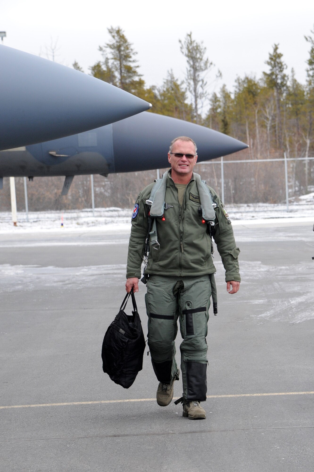 Lt. Col. William Kopp, 123rd Fighter Squadron, arrives in Yellowknife, Northwest Territories, for Exercise Vigilant Shield 2017, Oct. 17, 2016.  During this exercise, forces supporting North American Aerospace Defense Command (NORAD) will deploy and conduct air sovereignty operations in the far north and the high Arctic demonstrating the ability to detect, identify and meet possible threats in some of the most remote regions in the world.  (U.S. Air National Guard photo by Senior Master Sgt. Shelly Davison, 142nd Fighter Wing Public Affairs).  