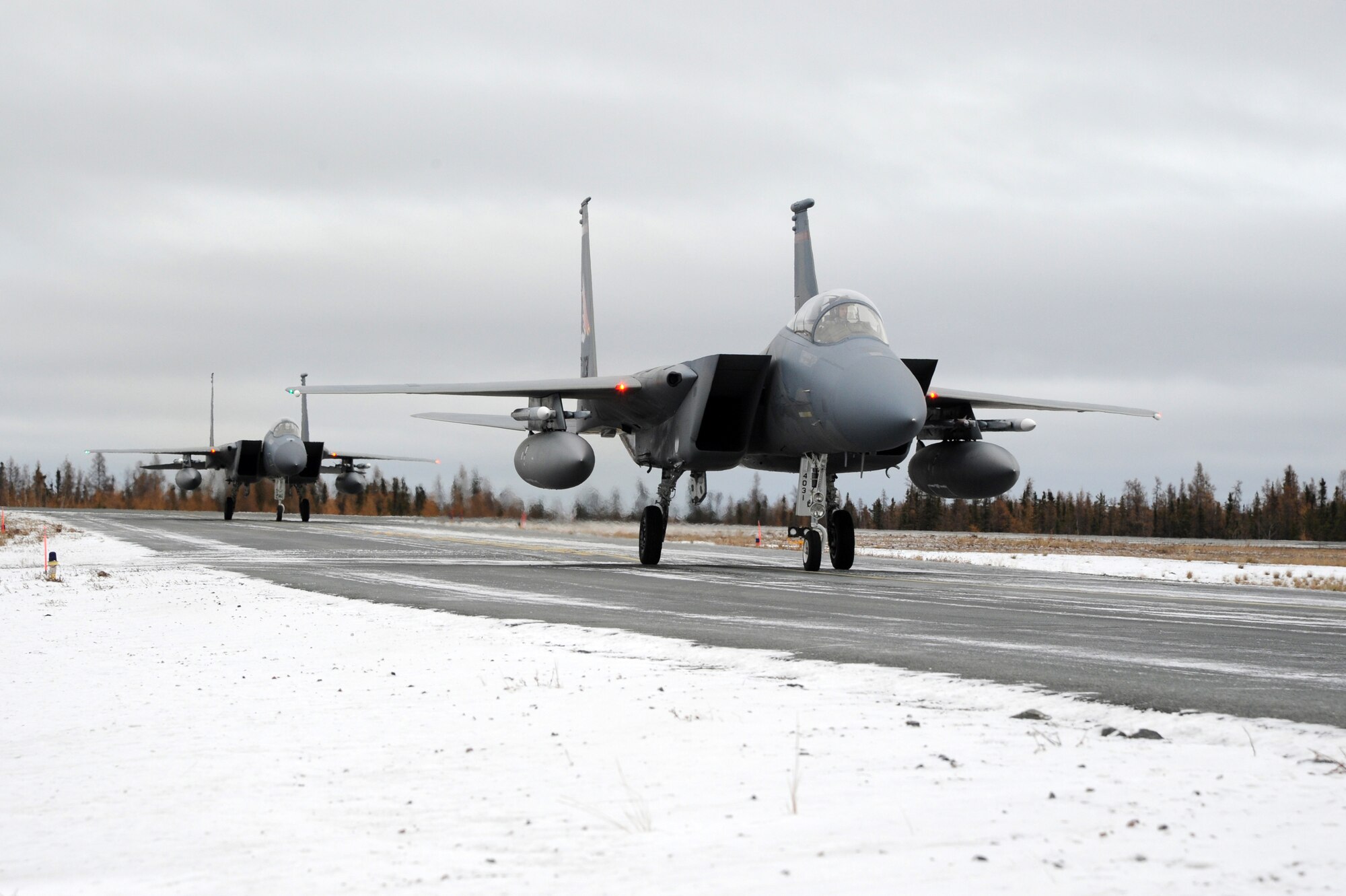 F-15 Eagles from the 142nd Fighter Wing arrive in Yellowknife, Northwest Territories, for Exercise Vigilant Shield 2017, Oct. 17, 2016. Vigilant Shield 17 represents a unique opportunity to practice and hone joint interoperability and cooperation skills between Canada and the United States in order to protect borders as well as national interests.  (U.S. Air National Guard photo by Senior Master Sgt. Shelly Davison, 142nd Fighter Wing Public Affairs).