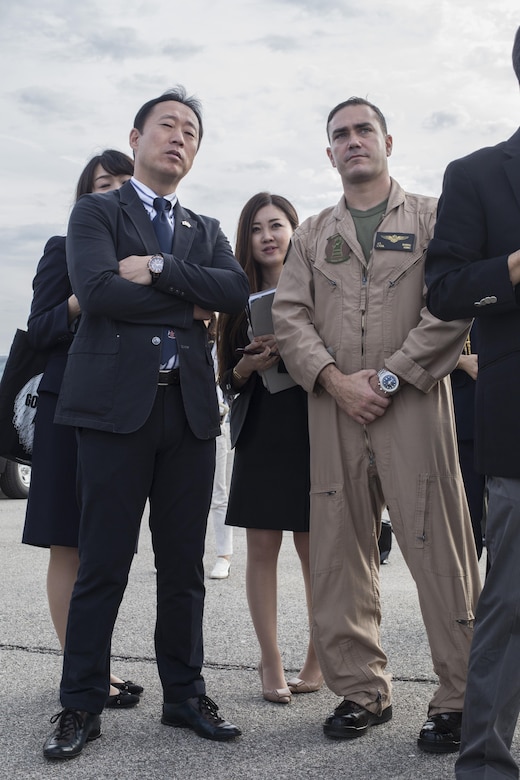 Yoshihiko Fukuda, mayor of Iwakuni City, Japan, and U.S. Marine Corps Lt. Col. J. T. Bordo, commanding officer of Marine Fighter attack Squadron (VMFA) 12 observes an F-35B Lightning II at Marine Corps Air Station (MCAS) Yuma, Arizona, Oct. 24, 2016. The demonstration of the F-35B gave Fukuda a better understanding of the aircraft and its capabilities. This event helped Fukuda better understand the capabilities of VMFA-121.(U.S. Marine Corps photo by Cpl. Nathan Wicks)

