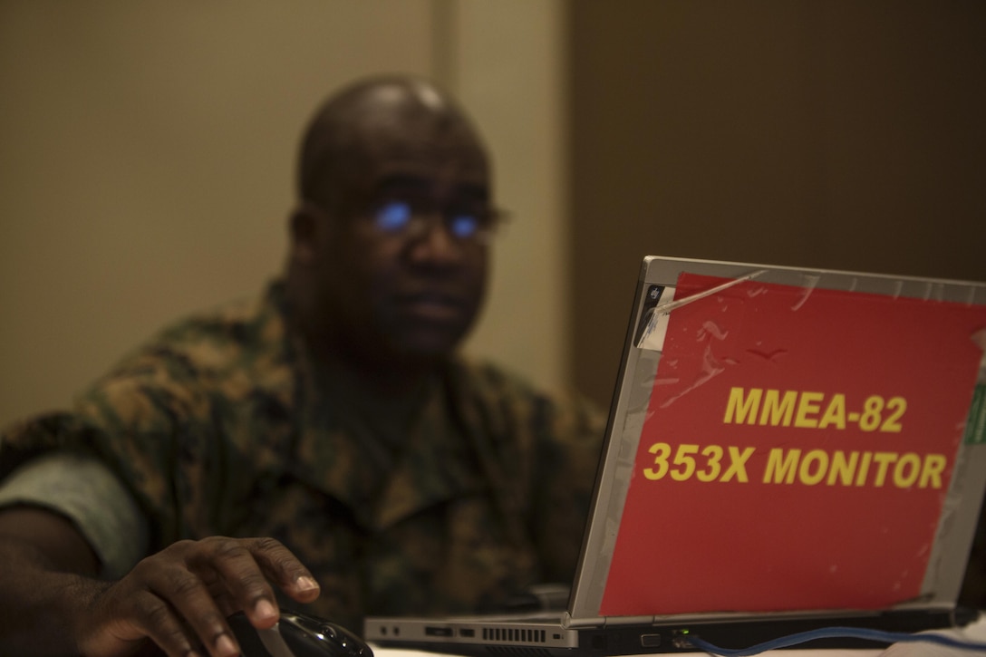 Master Gunnery Sgt. Eric Ingram sits down with Marines to help assist them in making well informed career decisions on Camp Kinser, Okinawa, Japan, Oct. 25, 2016. Ingram is a motor transport monitor for Manpower Management Division Enlisted Assignments, Headquarters United States Marine Corps. As a monitor, Ingram is responsible for conducting interviews with Marines to ensure they are stationed in positions where they have a better chance to grow individually and professionally. The monitors from MMEA are here conducting an annual visit to Okinawa, where they are able to sit down face-to-face with the Marines to discuss their future options.  (U.S. Marine Corps photo by Cpl. Jessica Etheridge / Released)