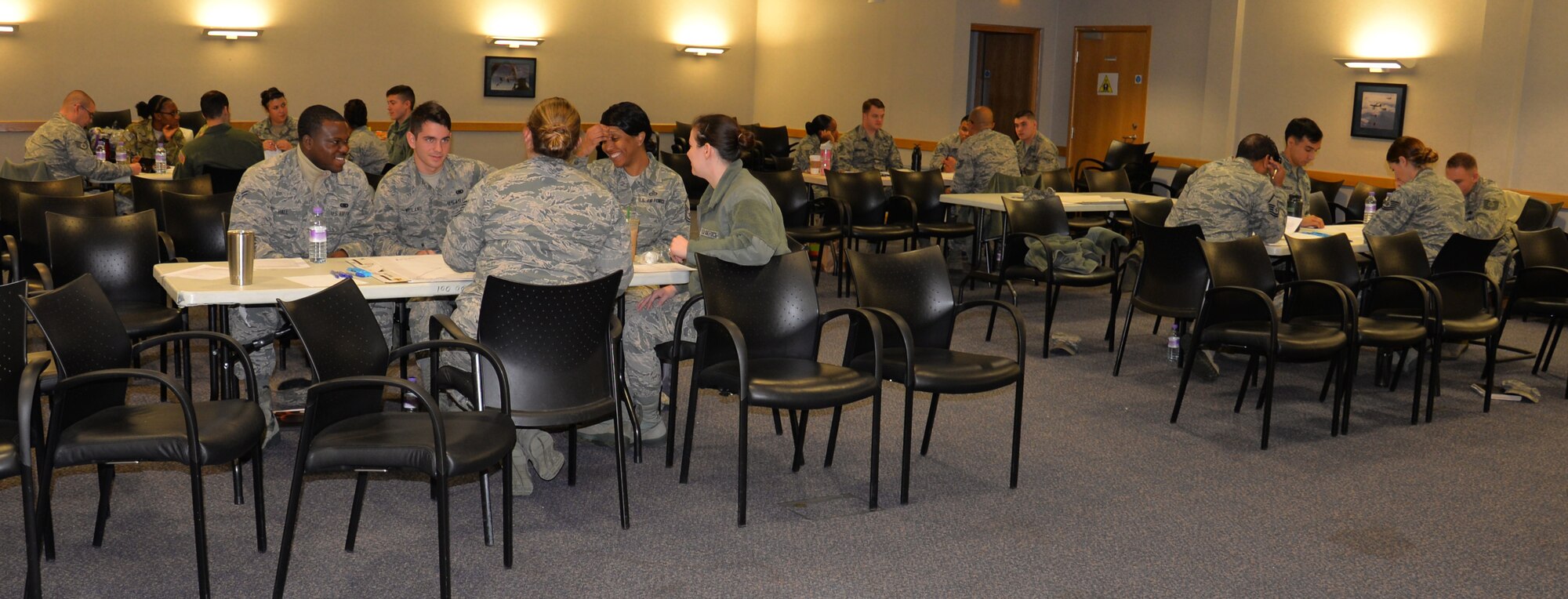 U.S. Air Force Airmen discuss careerism in the Air Force as part of a professional development class Oct. 19, 2016, on RAF Mildenhall, England. The training was about the group sharing ideas with each other, and then with leadership. (U.S. Air Force photo by Gina Randall)