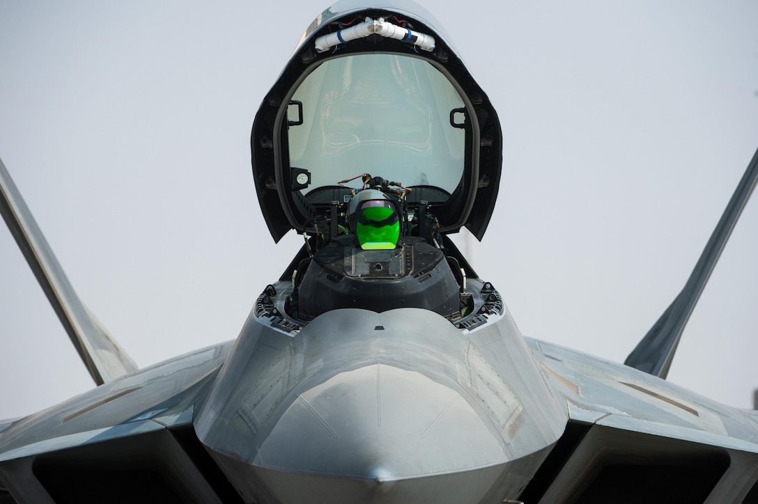 U.S. Air Force pilot prepares an F-22 Raptor for take off from an undisclosed location in Southwest Asia, Oct. 21, 2016. F-22 Raptors are one of several coalition airframes providing close air support to ground forces working to liberate the city of Mosul, Iraq. (U.S. Air Force photo by Senior Airman Tyler Woodward)